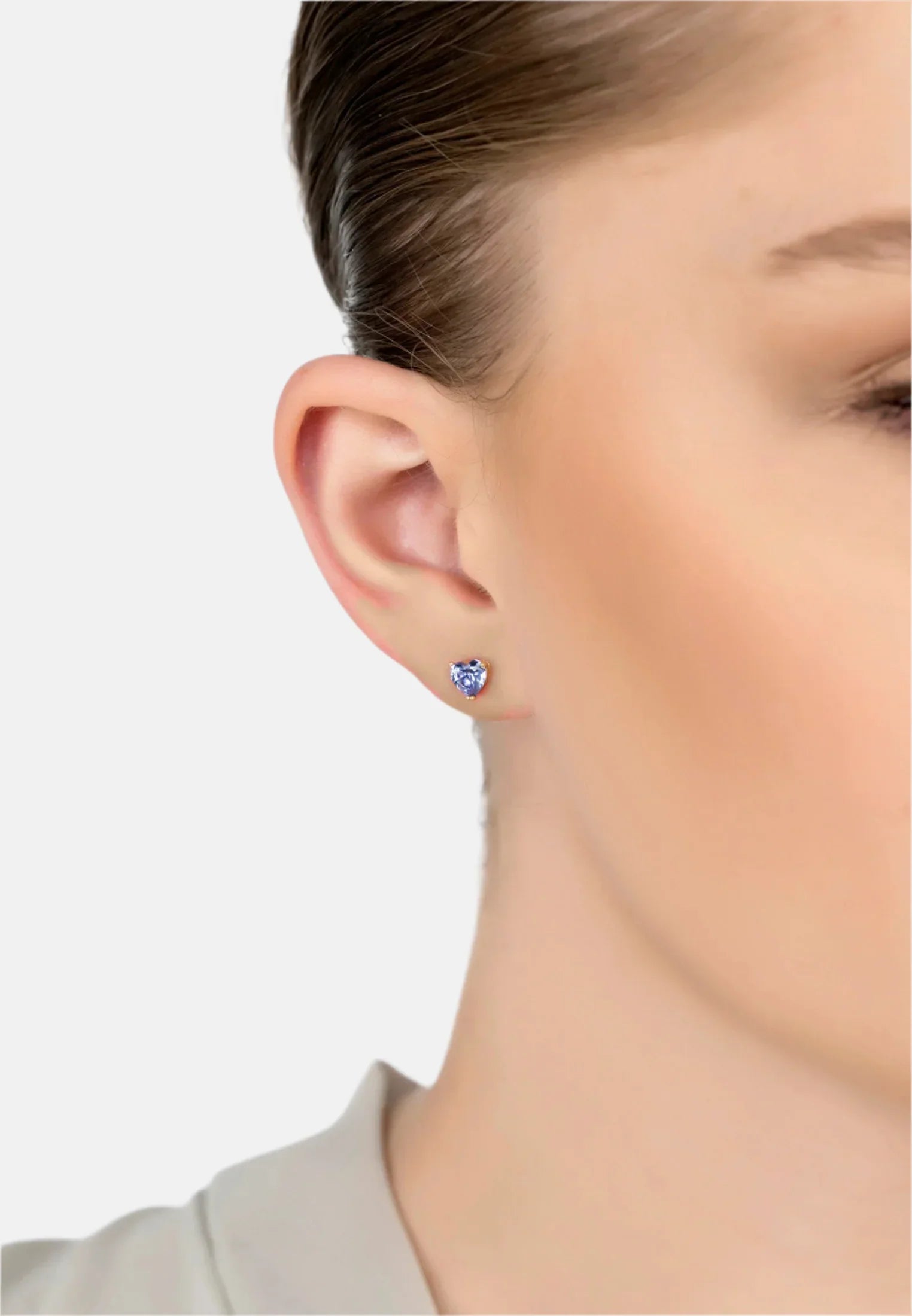 The earring worn by a model.
