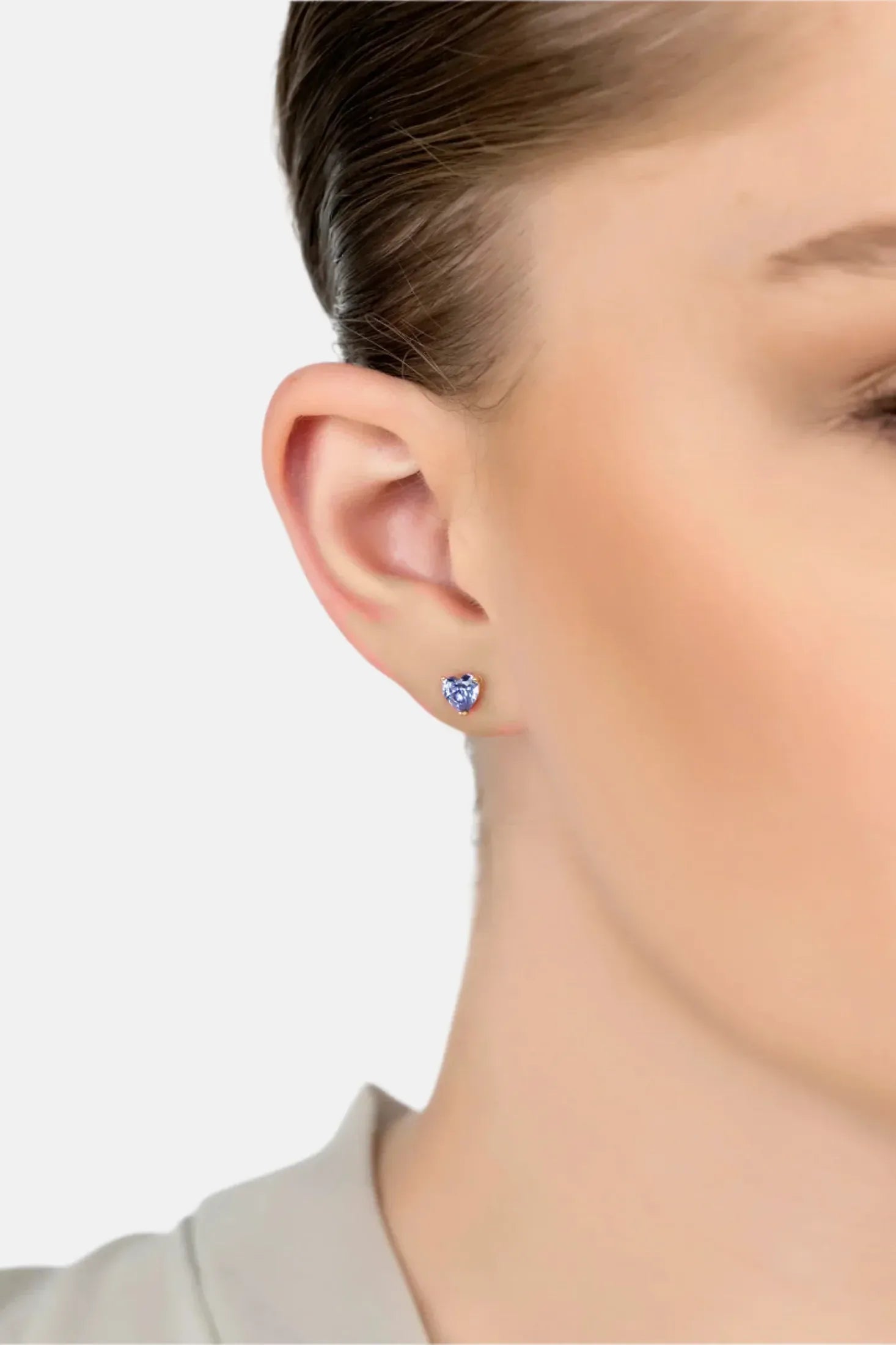 The earring worn by a model.