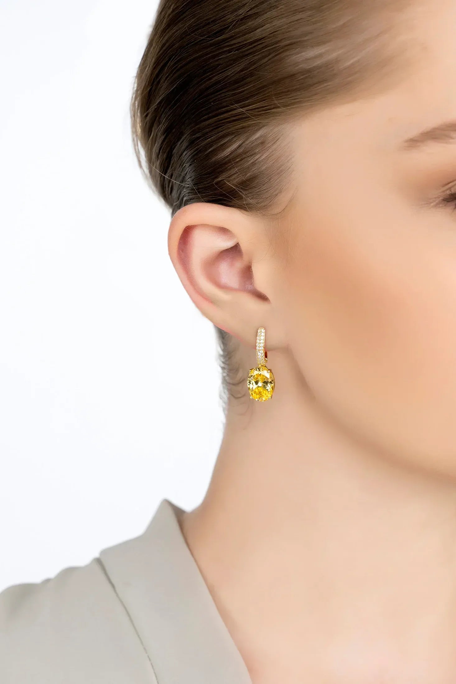 The earring worn by a model.