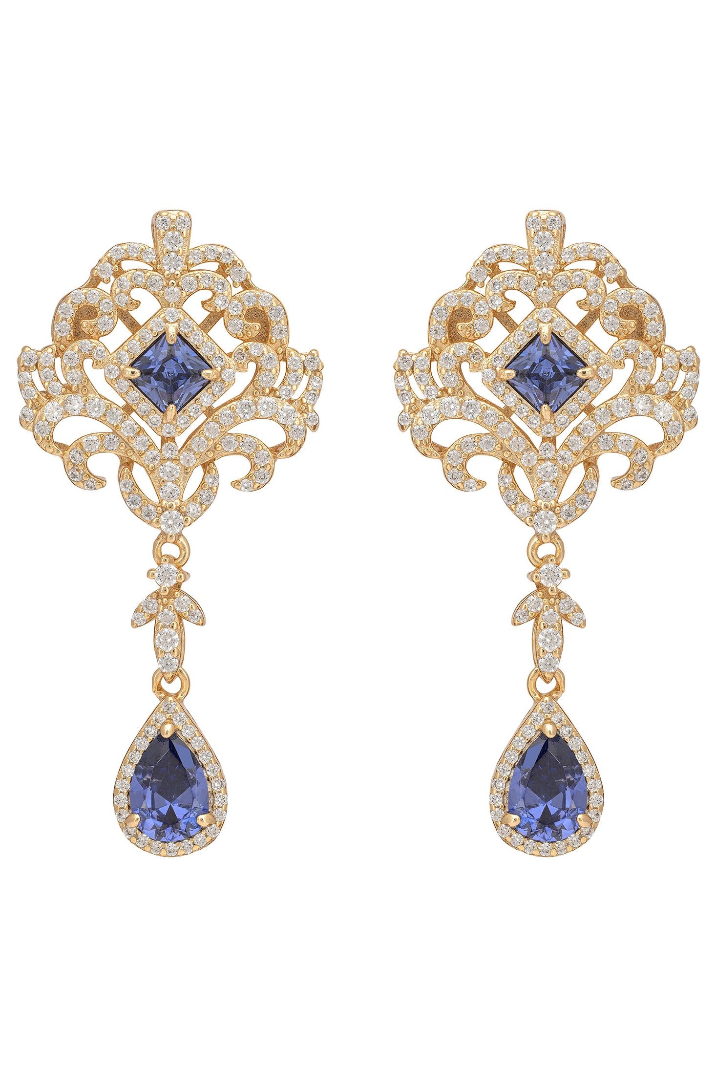 Pair of gold earrings with blue gemstones on a white background