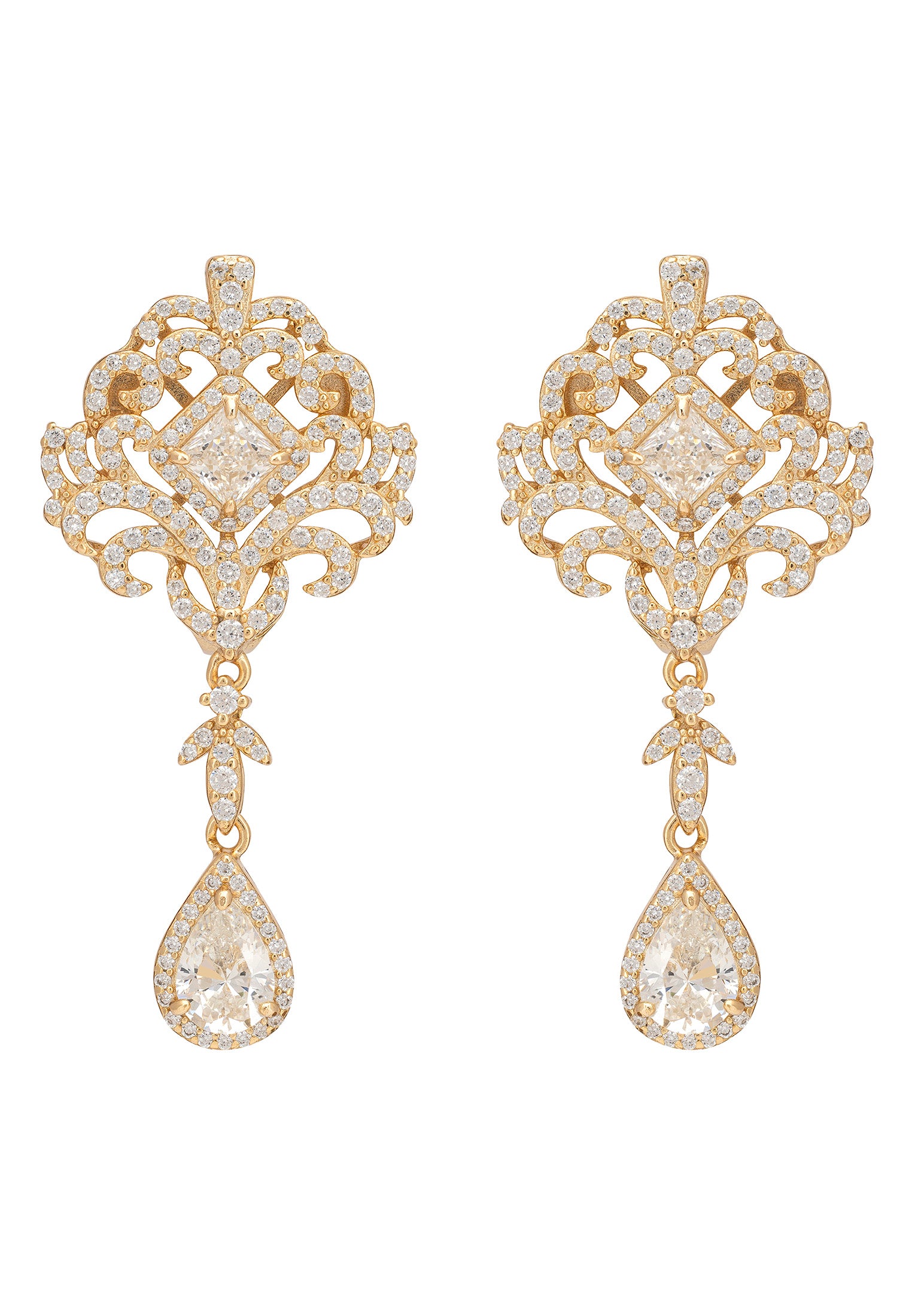 Pair of gold earrings with intricate designs on a white background