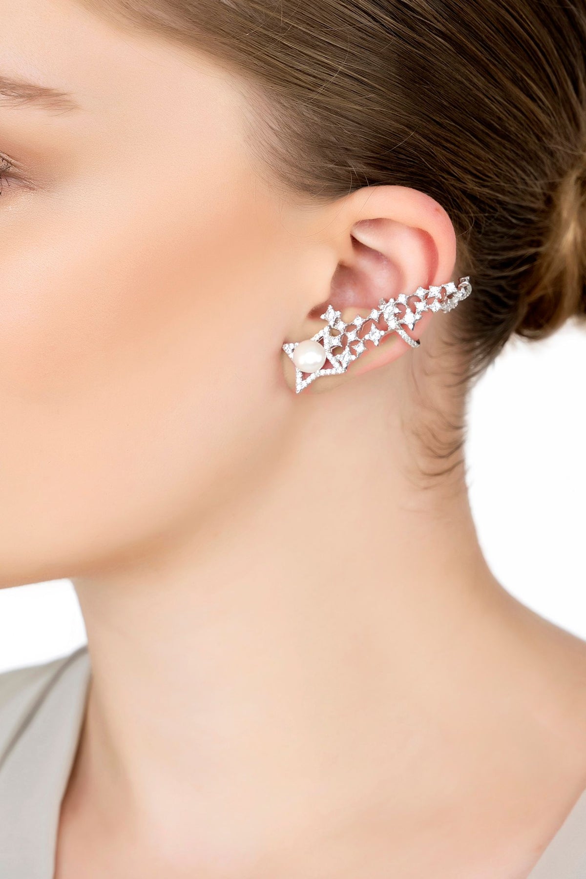 The ear climber worn by a model.