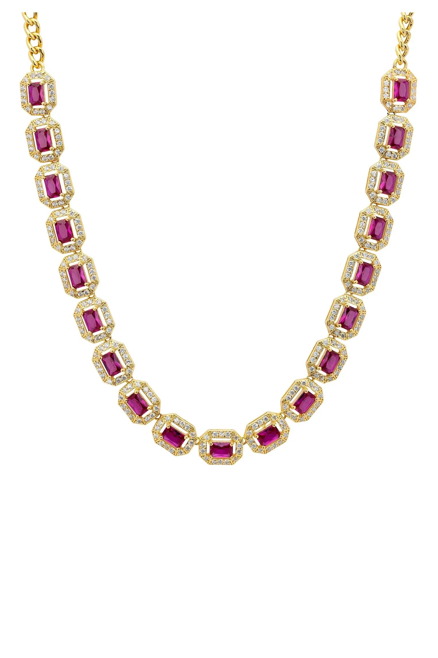 Close-up of the gold and diamond halo rubies.