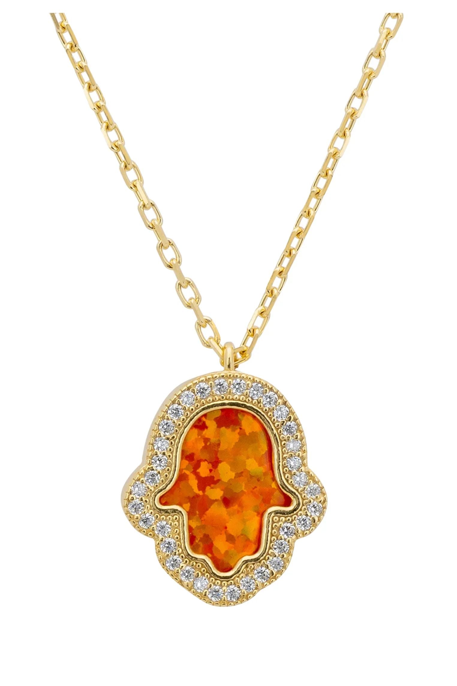 Close-up of the orange opal hamsa hand.