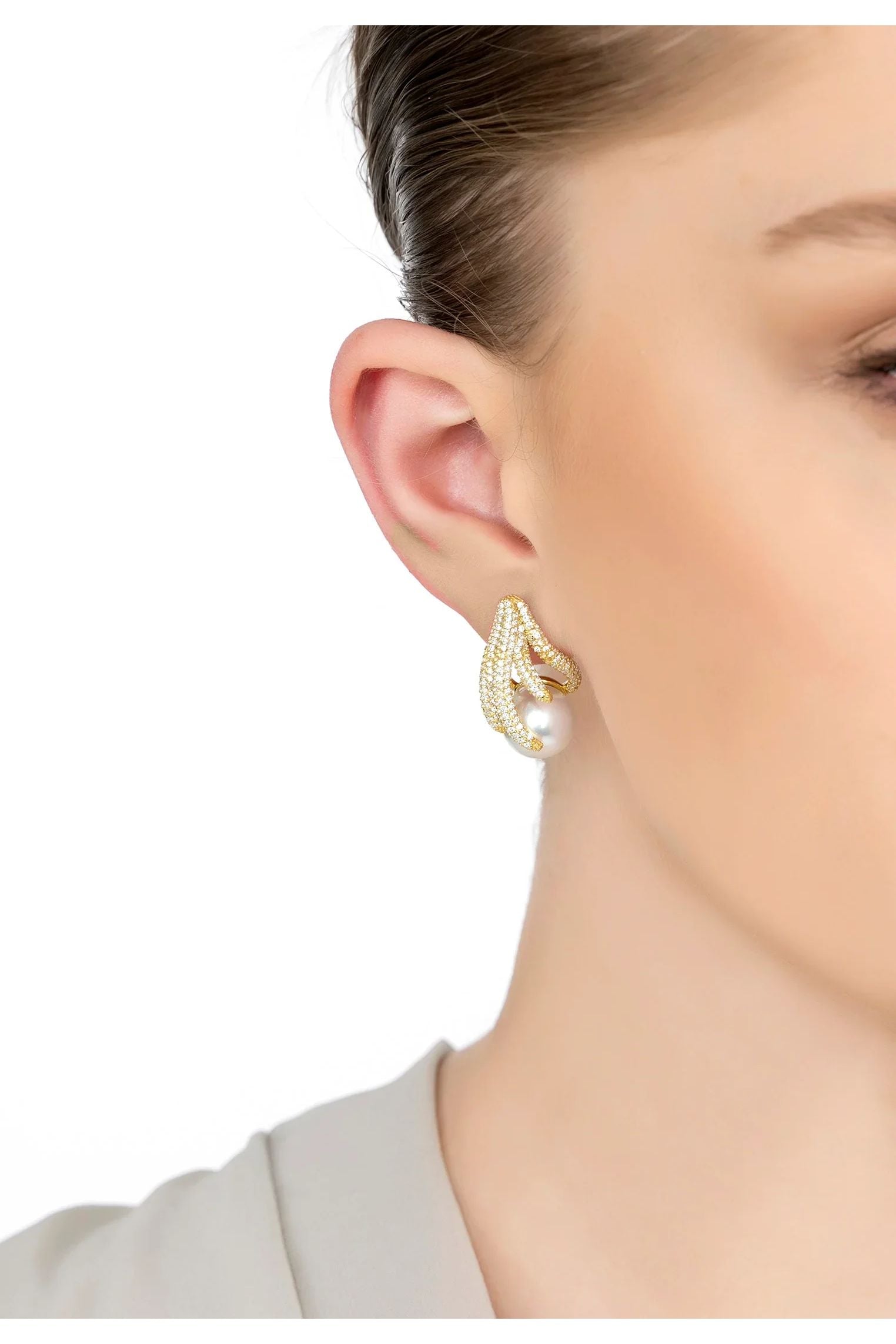 The earring worn by a model.