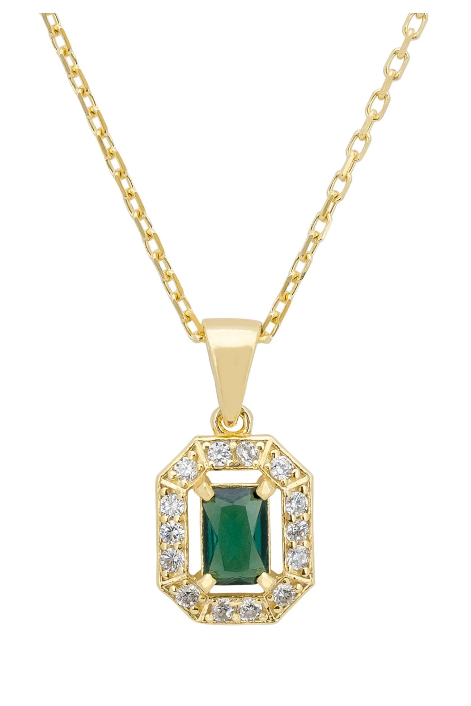 Close-up of the diamond halo emerald pendant.