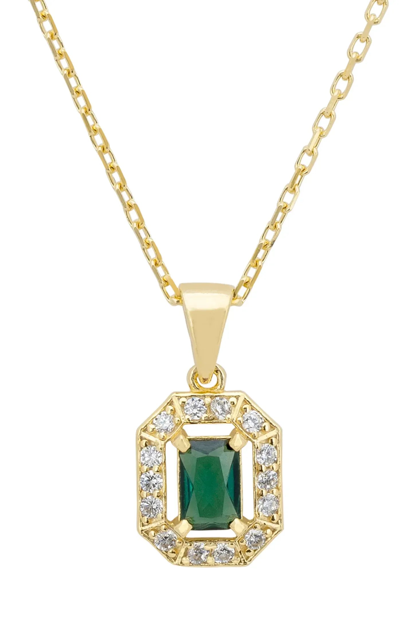 Close-up of the diamond halo emerald pendant.