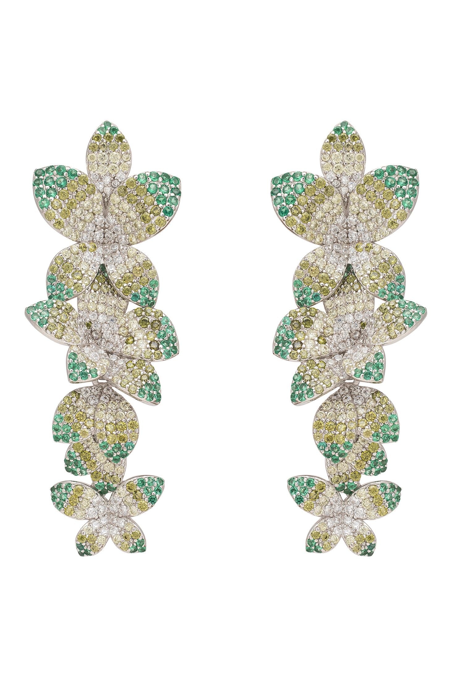 Pair of flower-shaped earrings with green and white stones on a white background