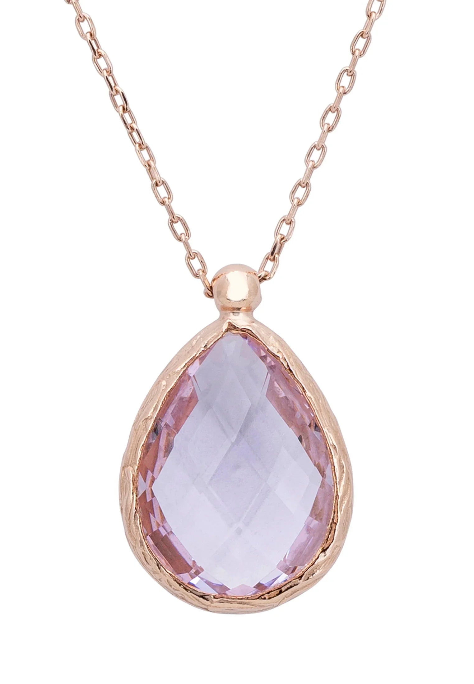 Close-up of the teardrop rose quartz rose gold pendant.