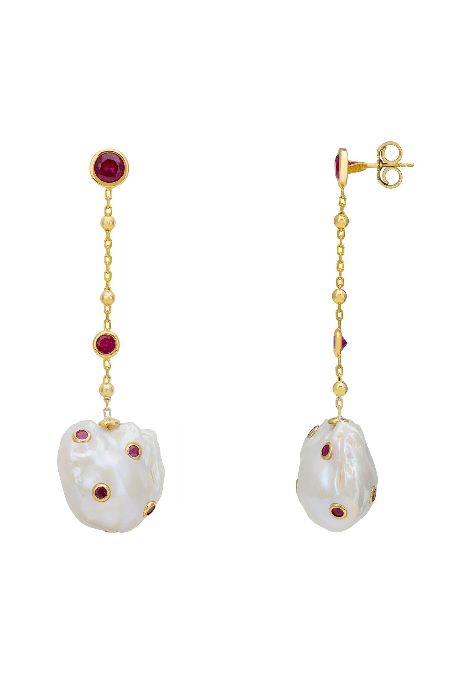 Angled view of Polka Dot Baroque Pearl Chain Drop Earrings Gold Ruby, showing baroque pearl and pearl detailing, gold finish and the jewellery profile.