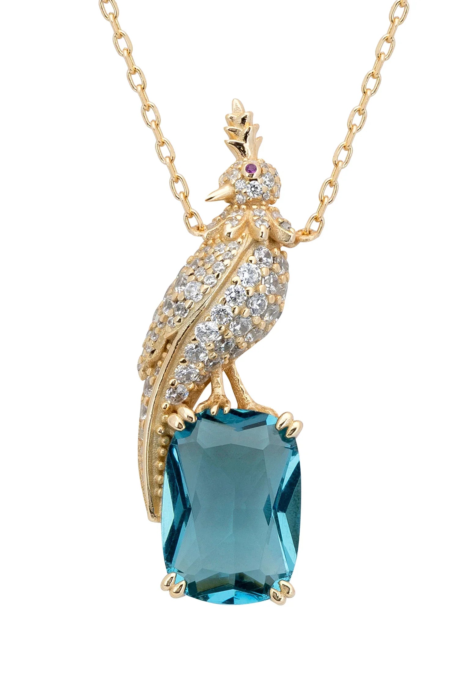 Close-up of the diamond and gold bird perched on a blue gemstone charm.