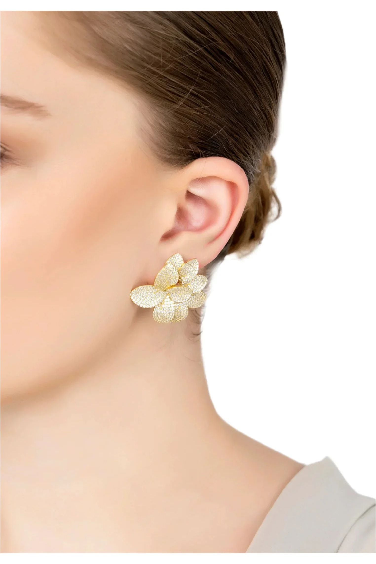 The earring worn by a model.