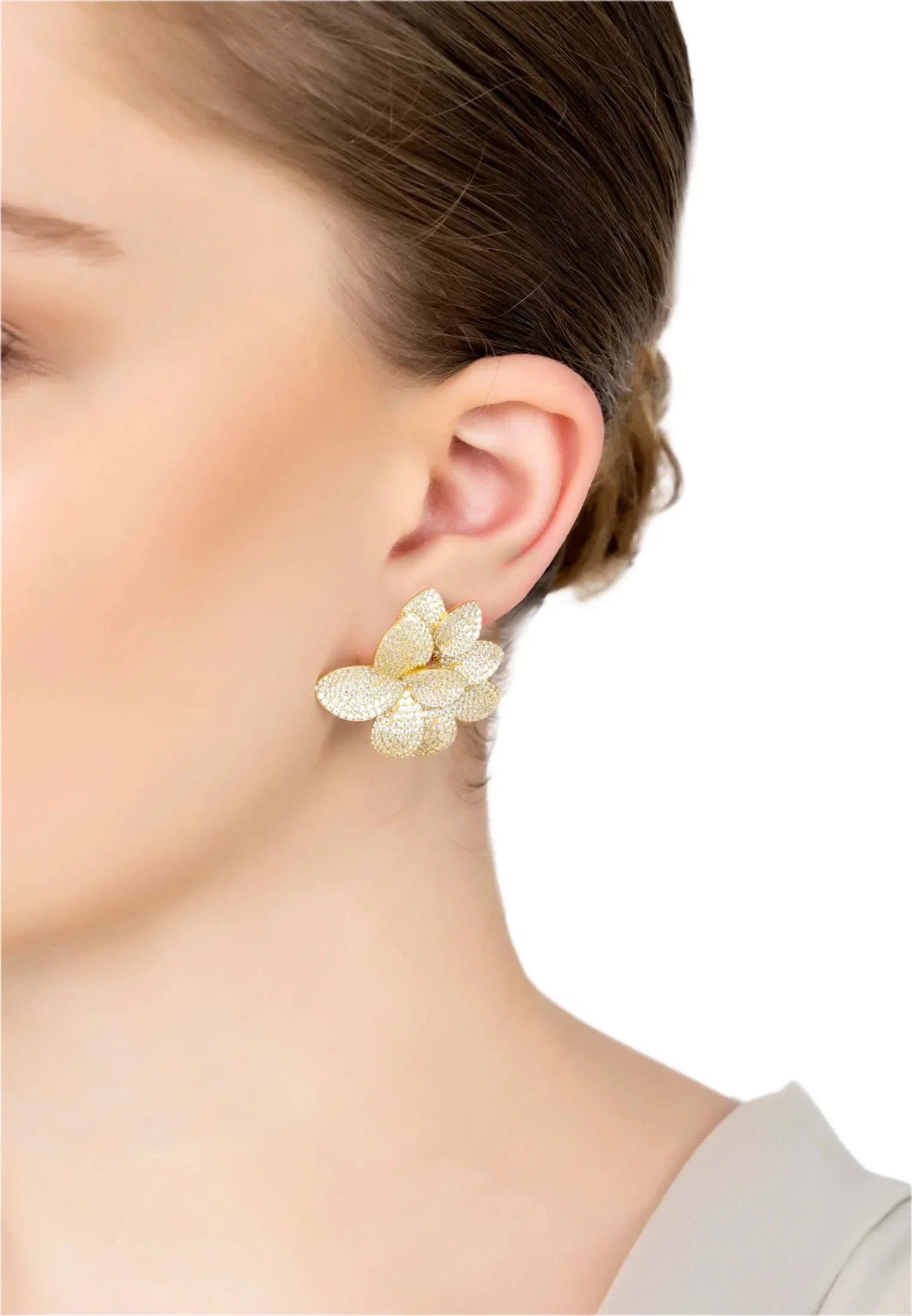 The earring worn by a model.