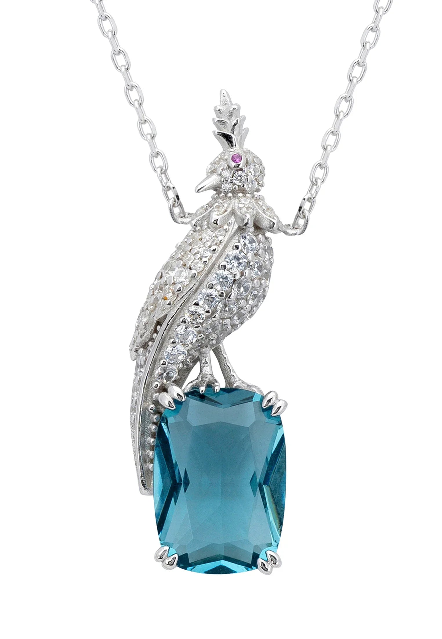 Close-up of the diamond bird perched on a blue gemstone.