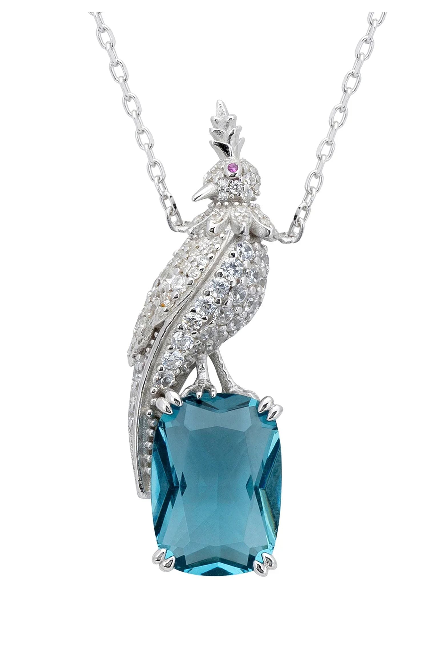Close-up of the diamond bird perched on a blue gemstone.