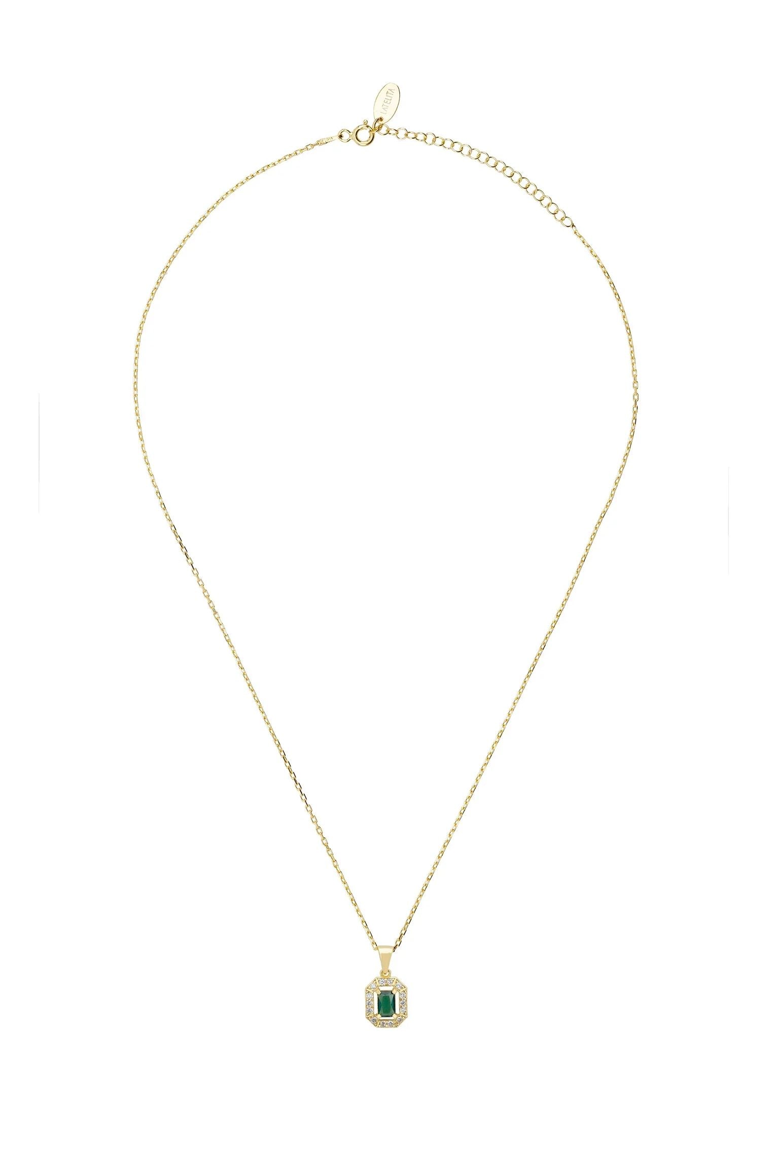 Diamond halo emerald gold pendant necklace.