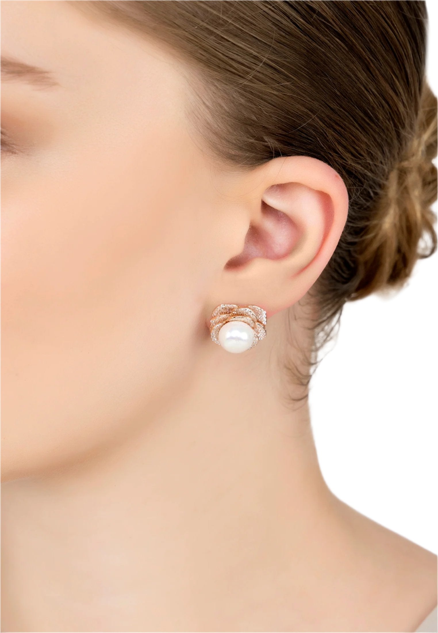 The earring worn by a model.