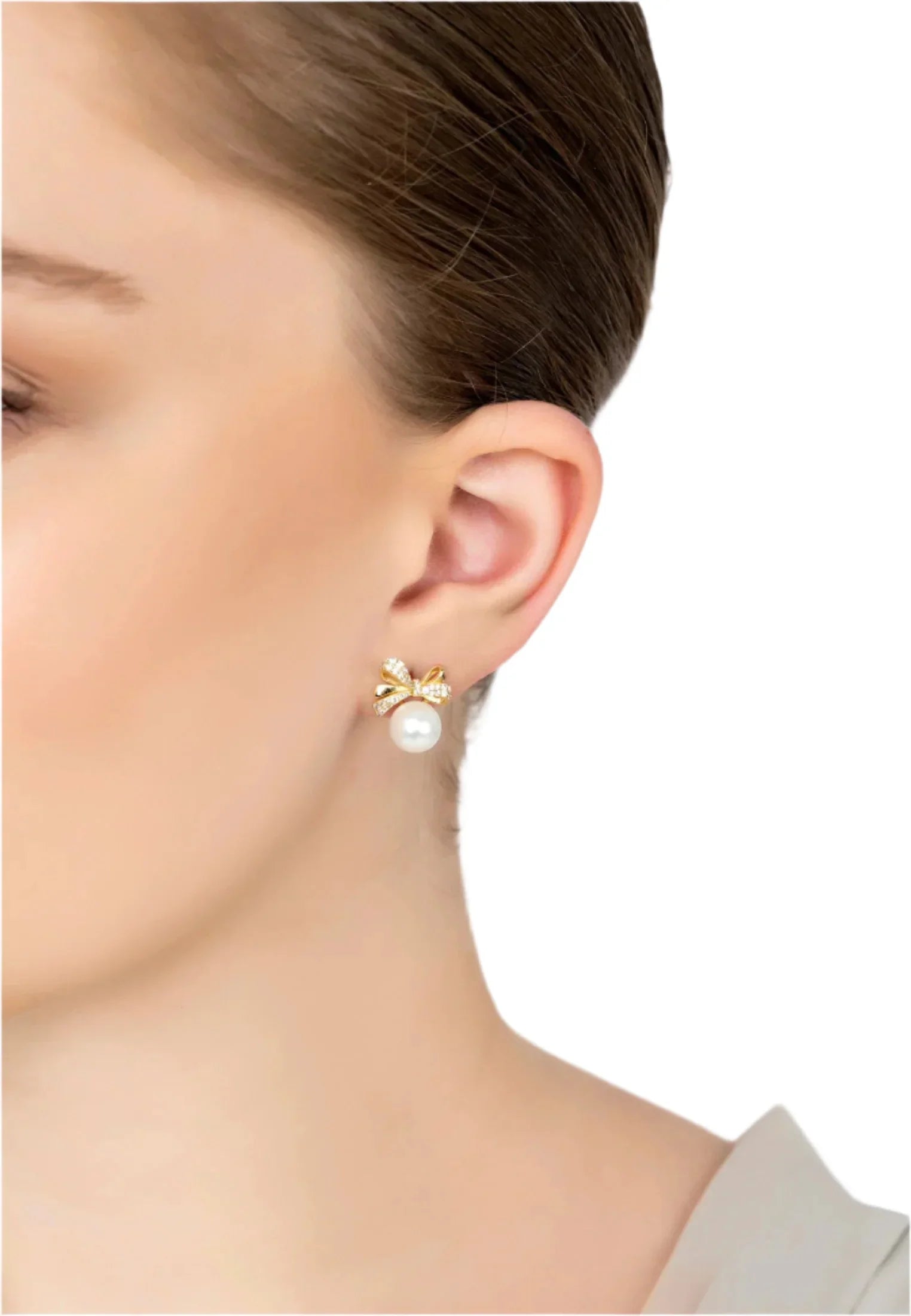 The earring worn by a model.