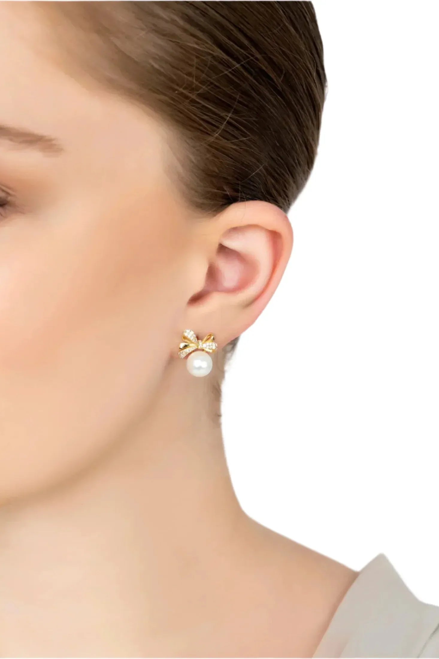 The earring worn by a model.
