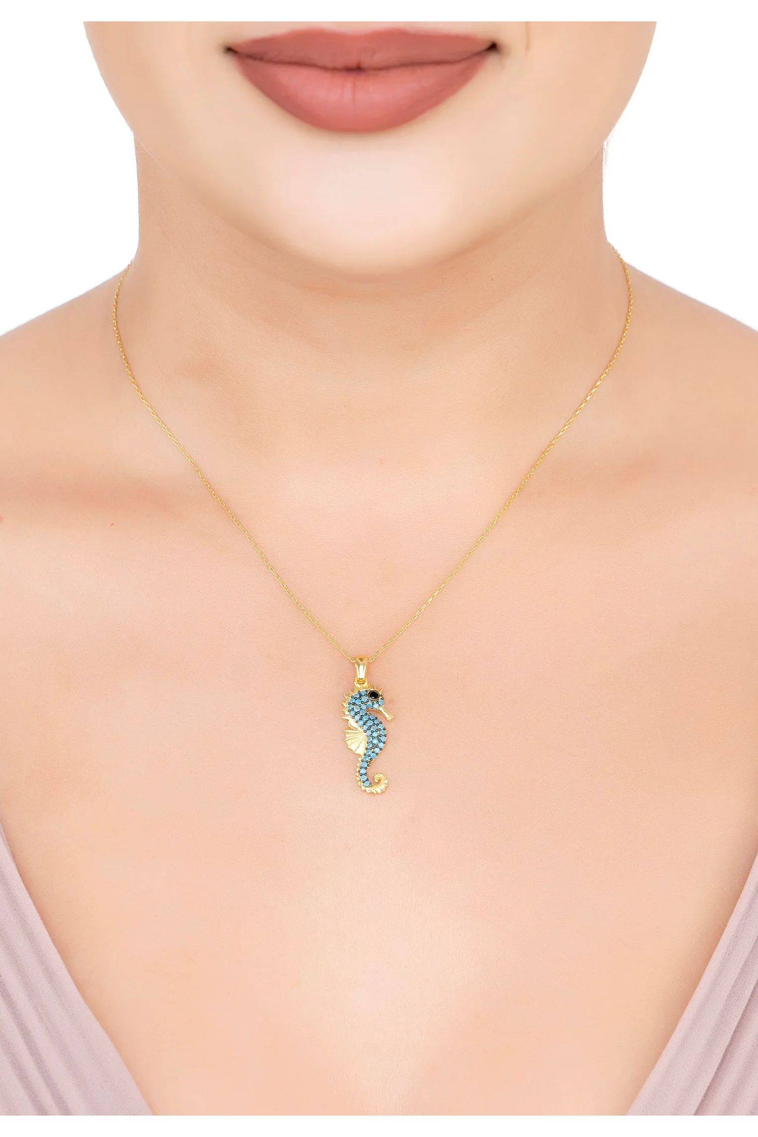 The necklace worn by a model.