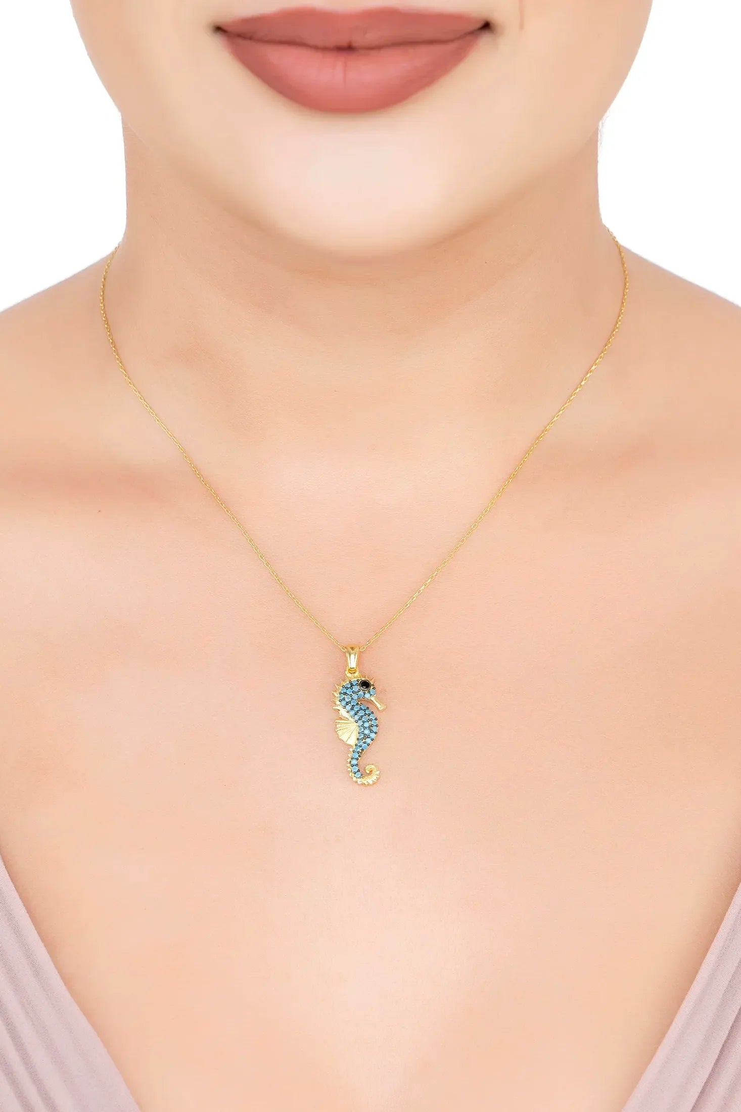 The necklace worn by a model.