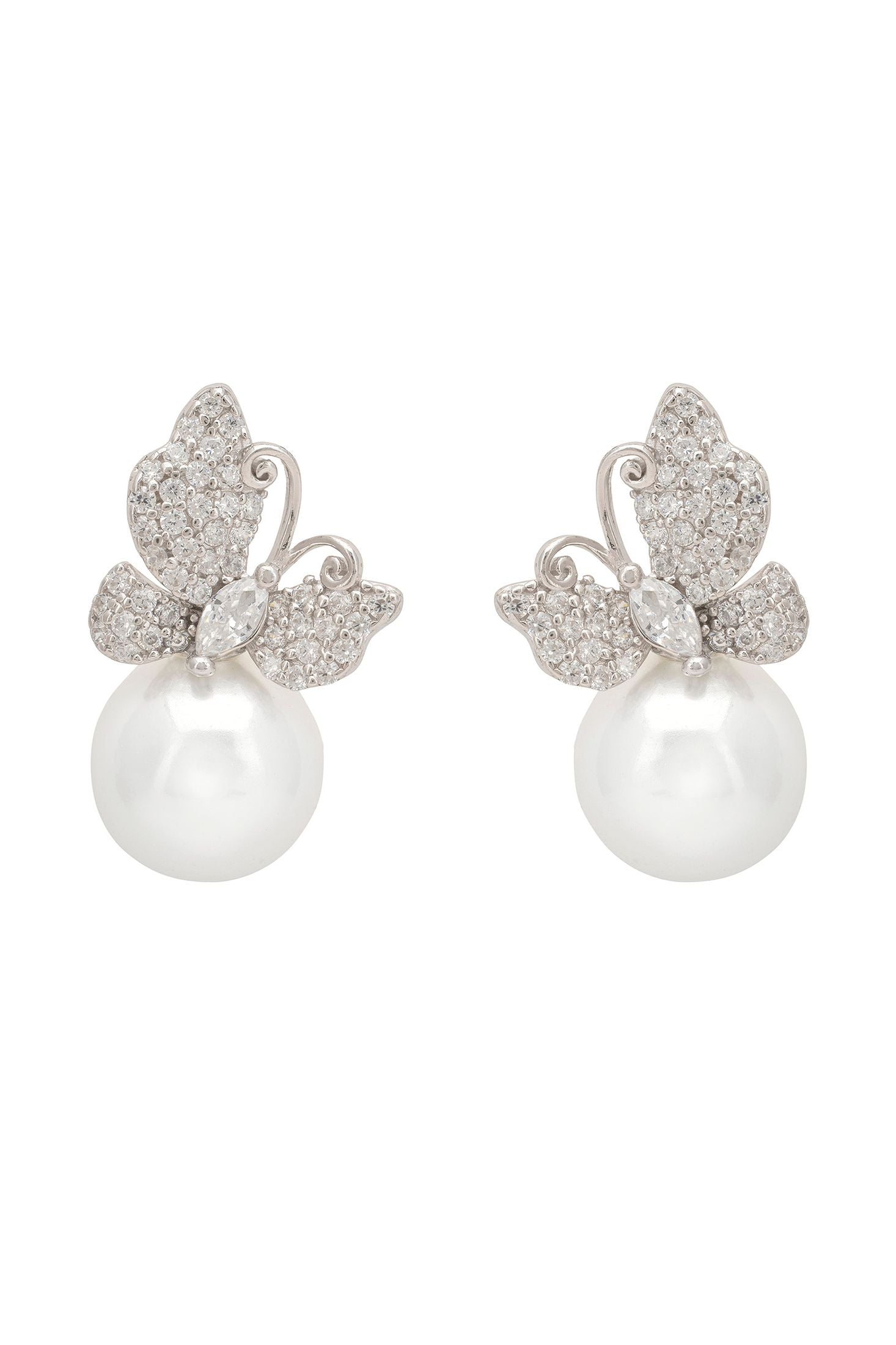 Pearl earrings with butterfly-shaped silver and diamond accents on a white background
