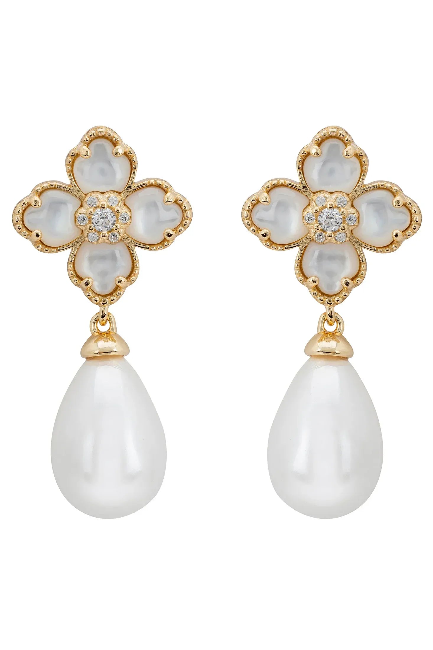 Pearl and white clover gold earrings.