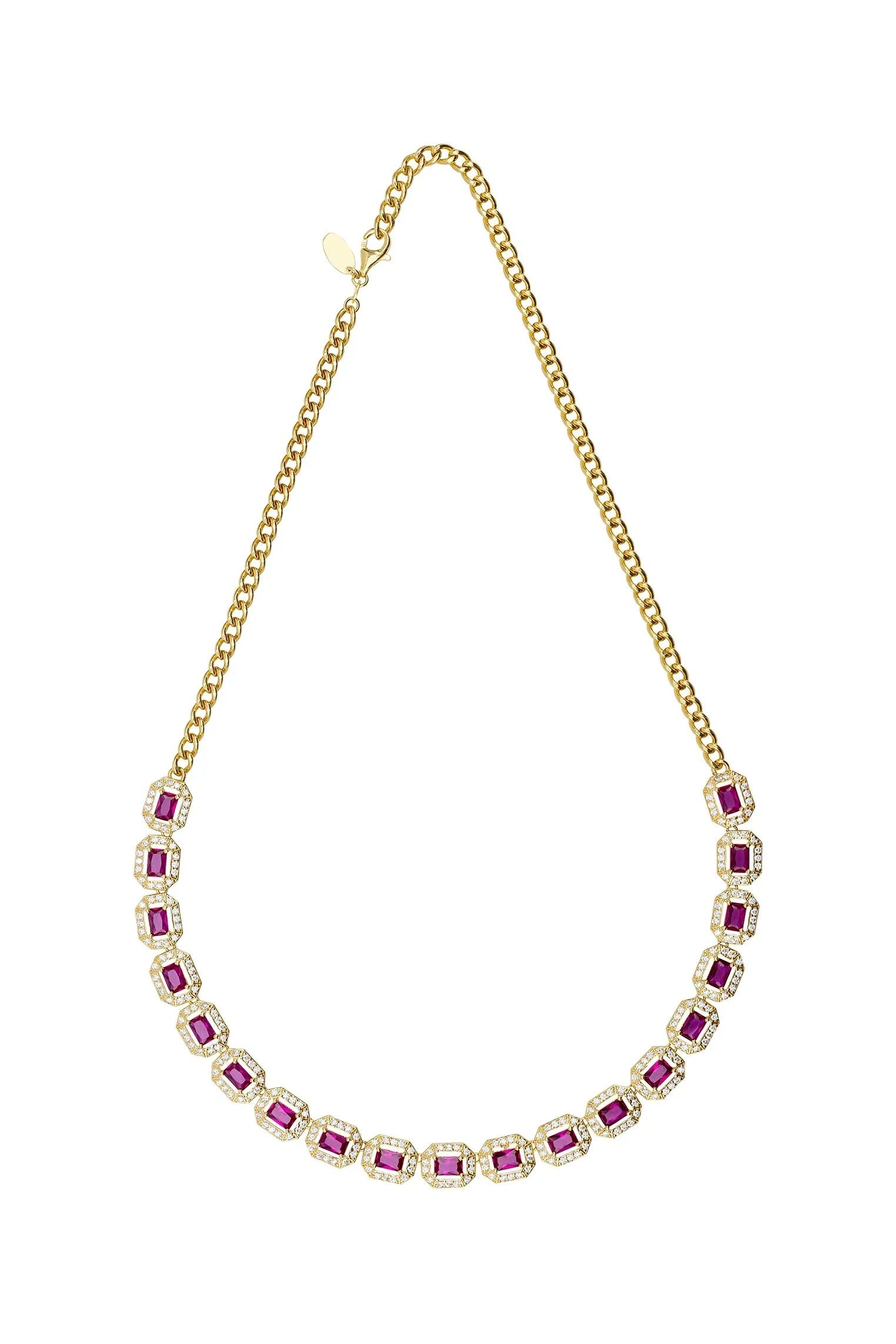 Gold and diamond halo ruby necklace.