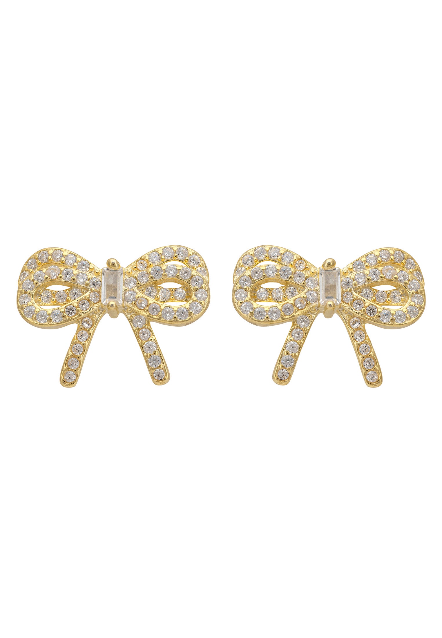 Gold bow-shaped earrings with clear gemstones on a white background