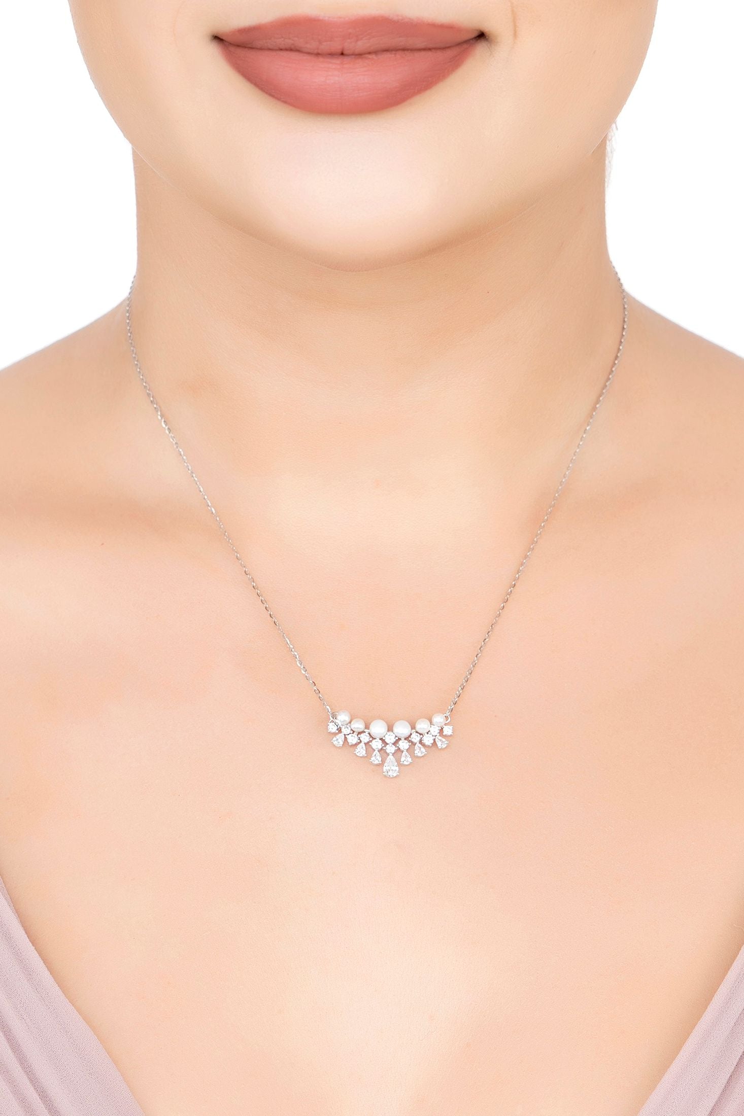 The necklace worn by a model.