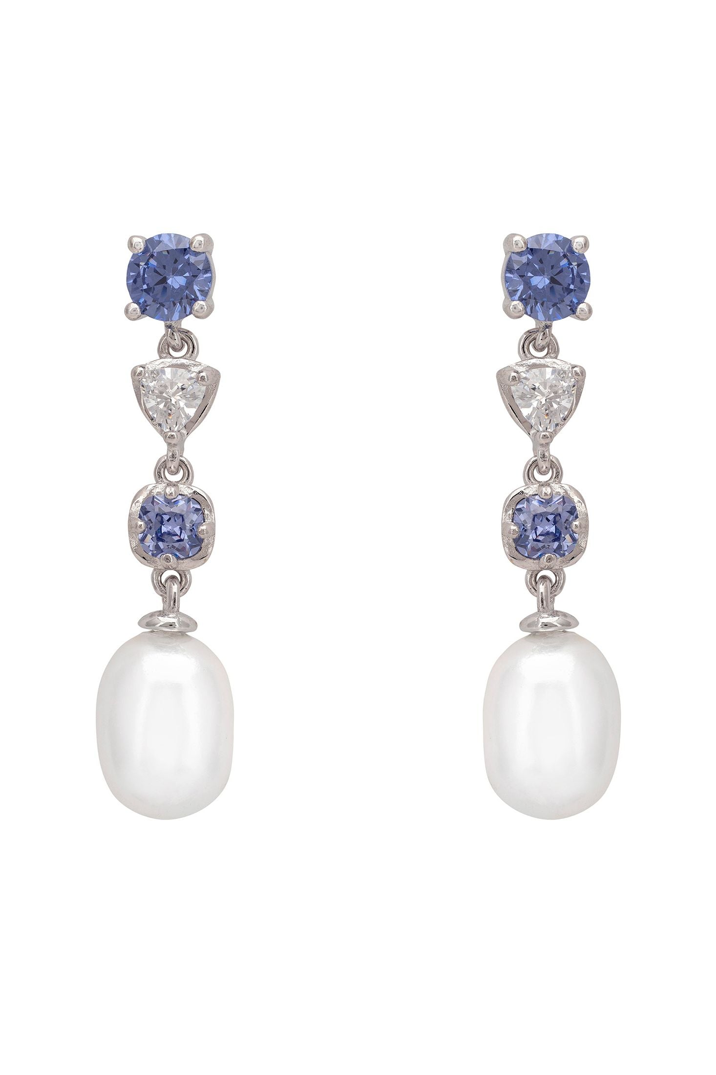Pair of earrings with pearls and blue gemstones on a white background