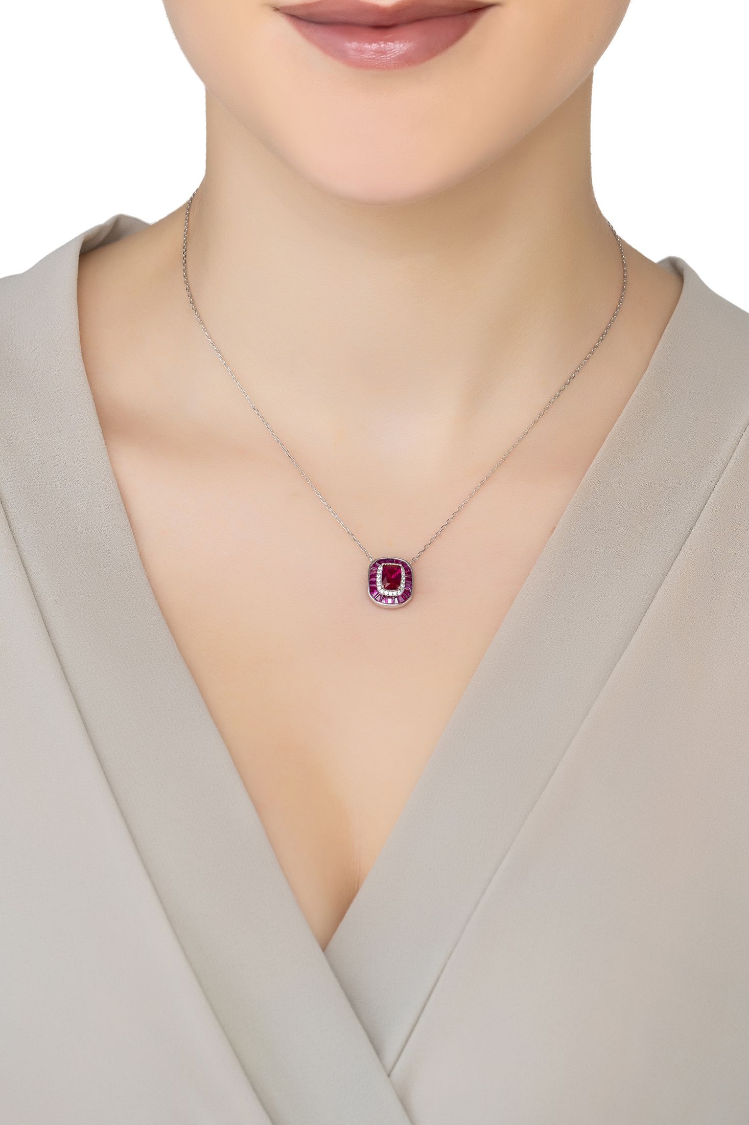 Angled view of Great Gatsby Pendant Necklace Ruby Silver, showing ruby detailing, silver finish and the jewellery profile.