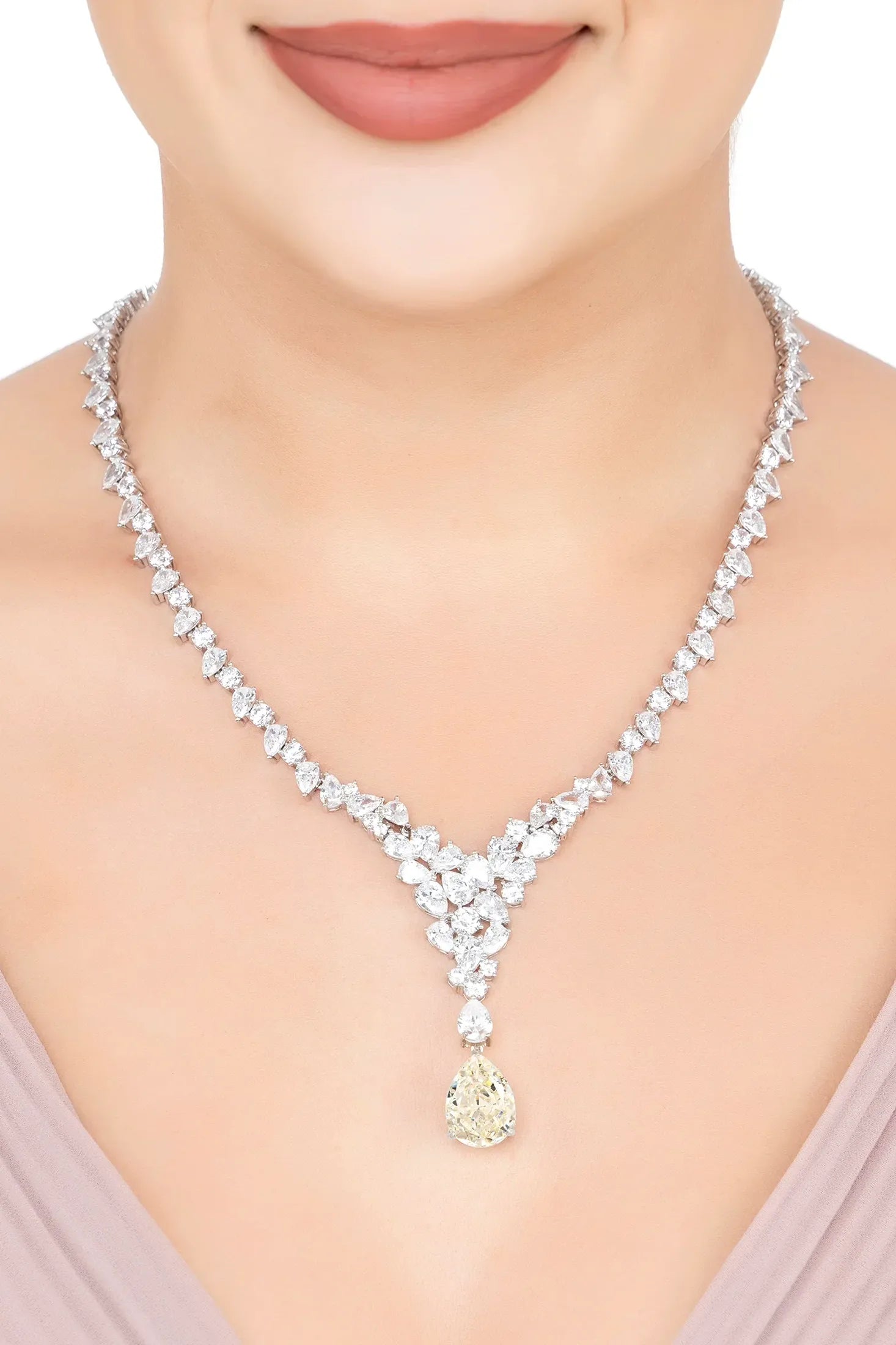 The necklace worn by a model.