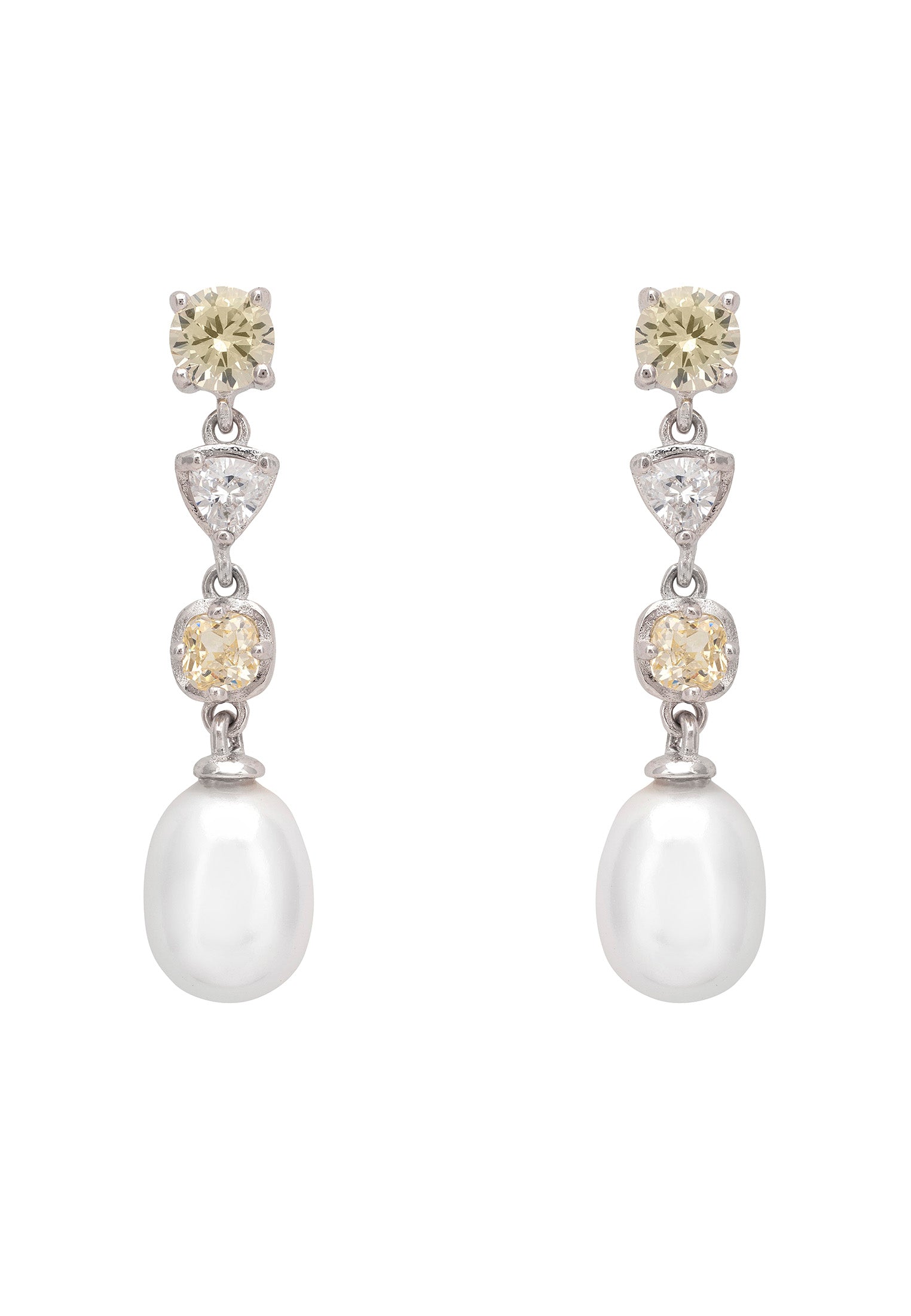 Pair of pearl and yellow gemstone earrings on a white background