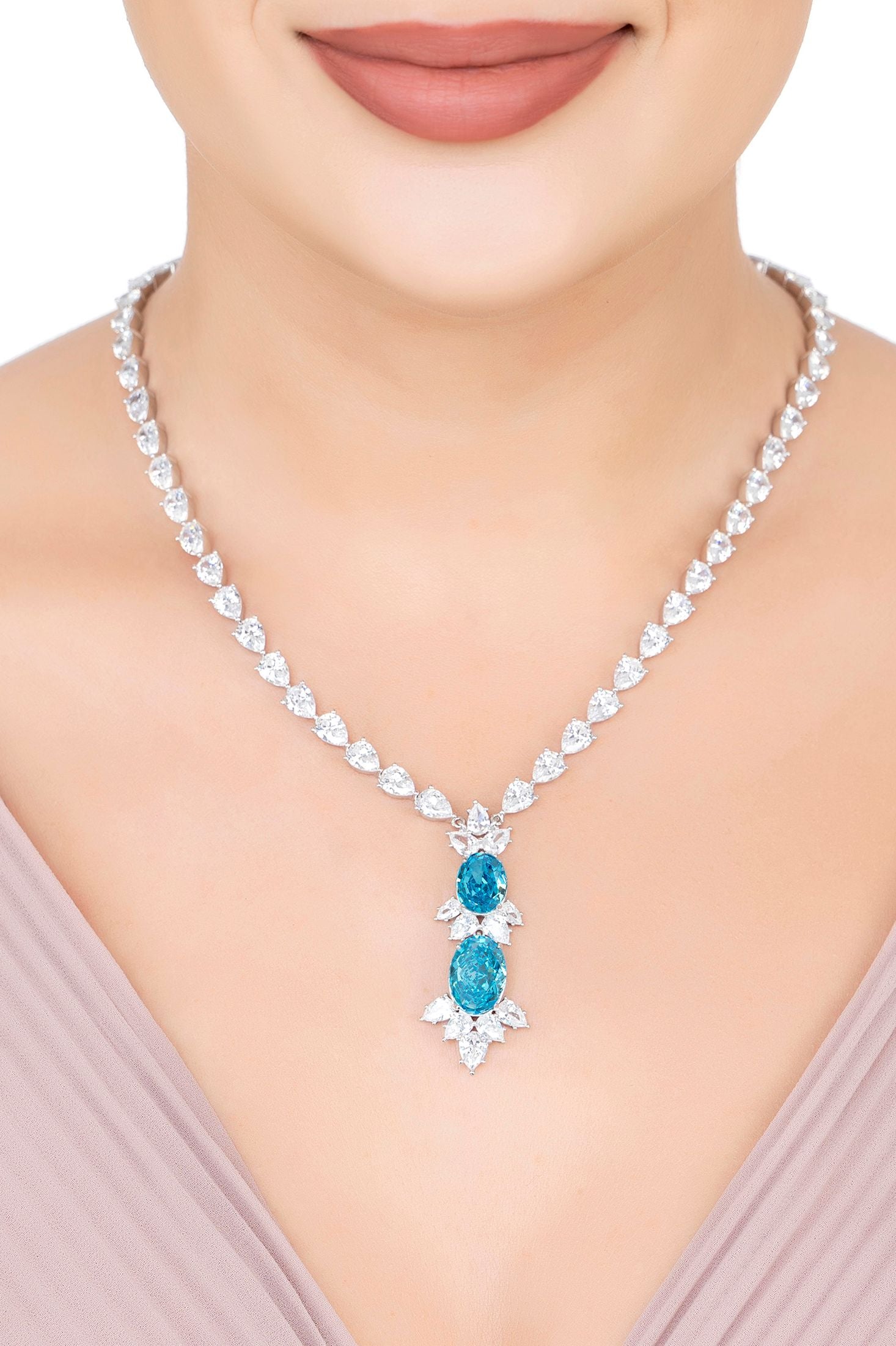 The necklace worn by a model.