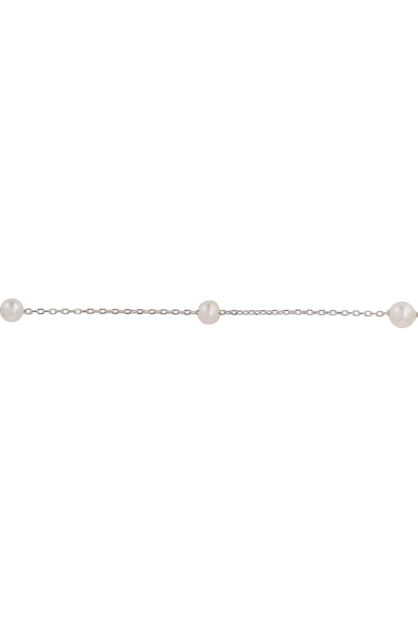 Silver bracelet with pearls on a white background