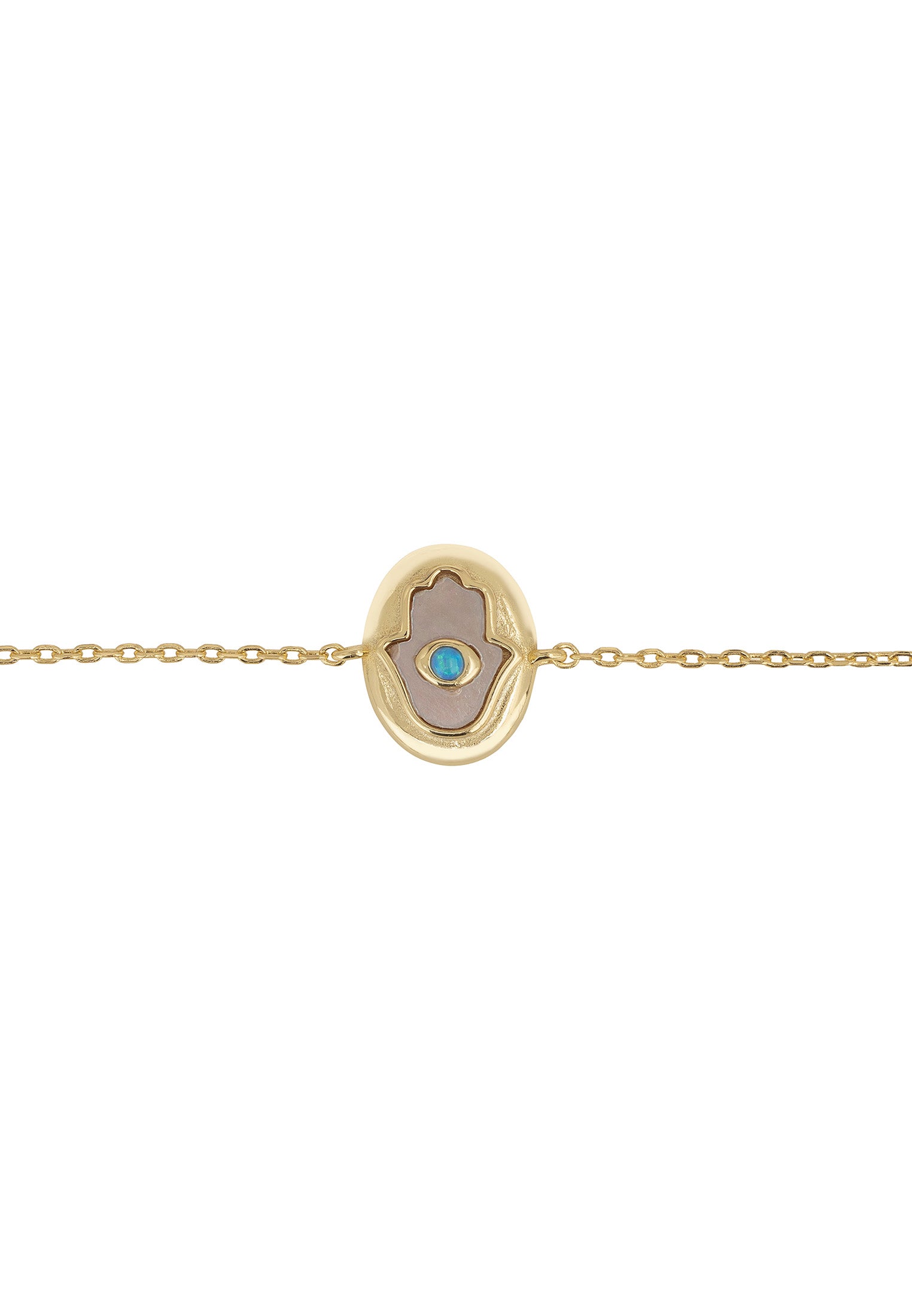 Gold bracelet with a circular charm featuring a blue gemstone on a white background