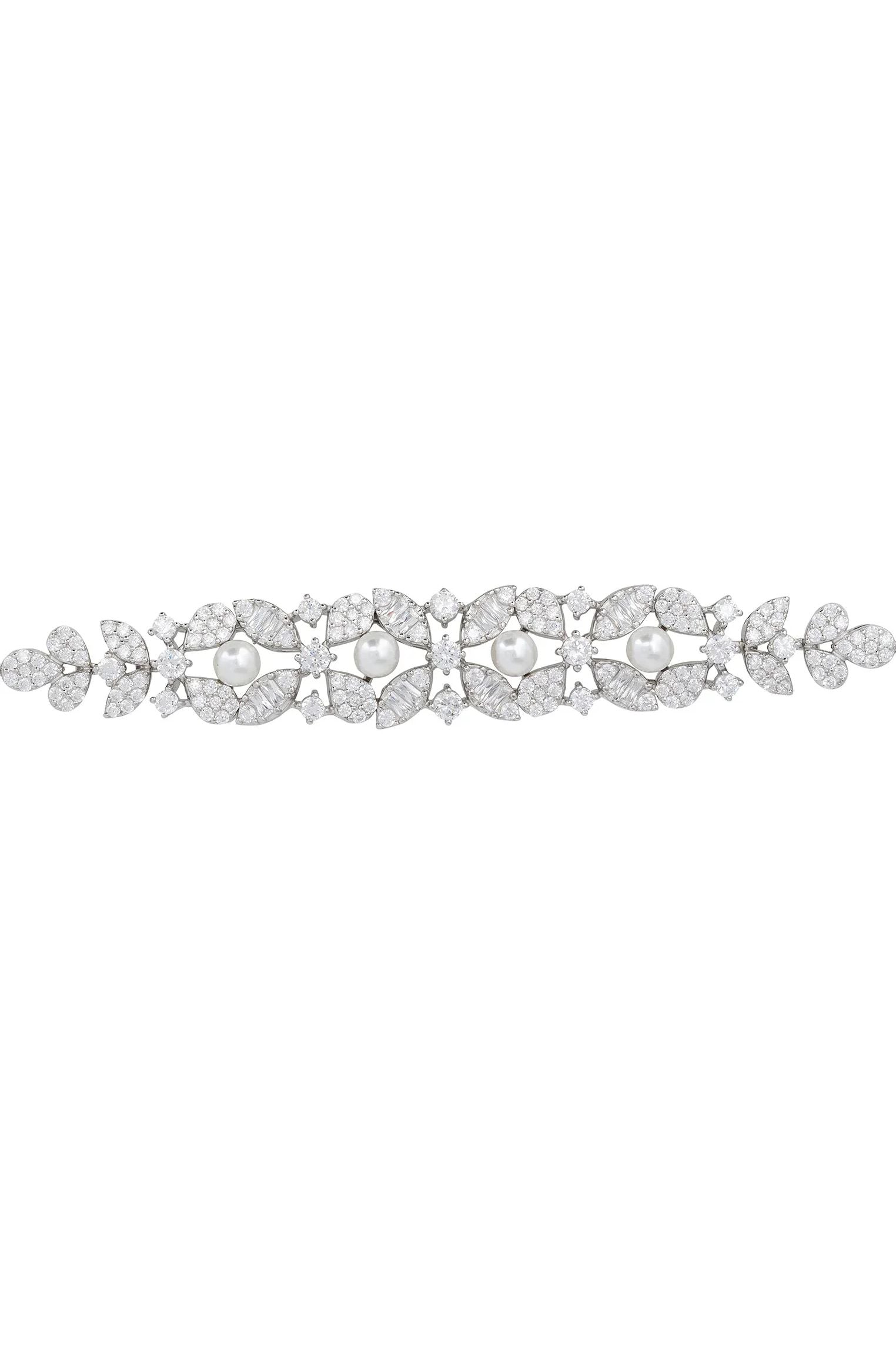 Floral diamond bracelet with pearls.