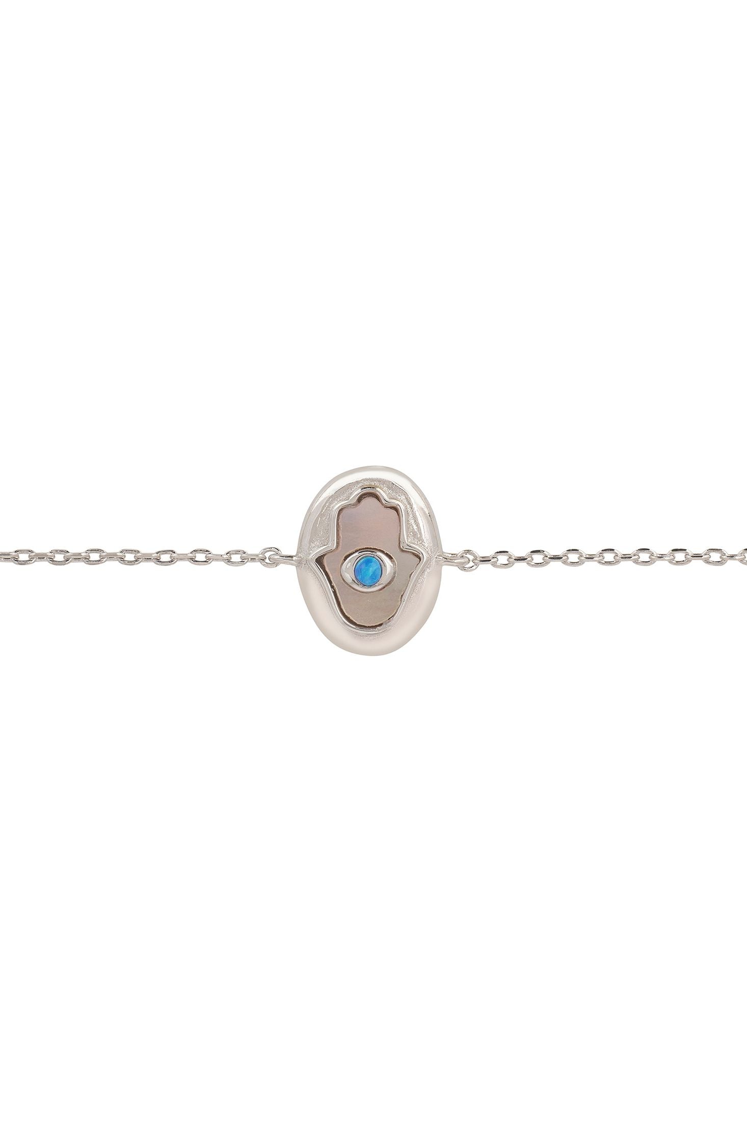 Silver bracelet with a blue gemstone on a white background