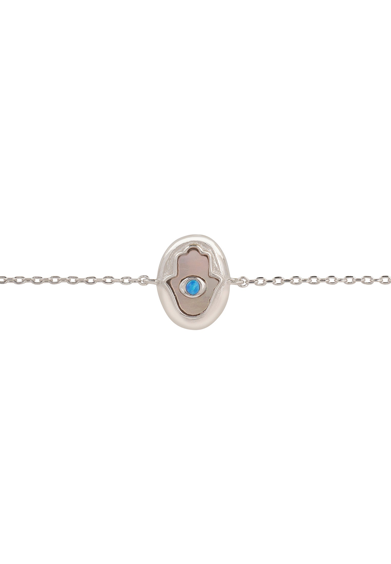 Silver bracelet with a blue gemstone on a white background
