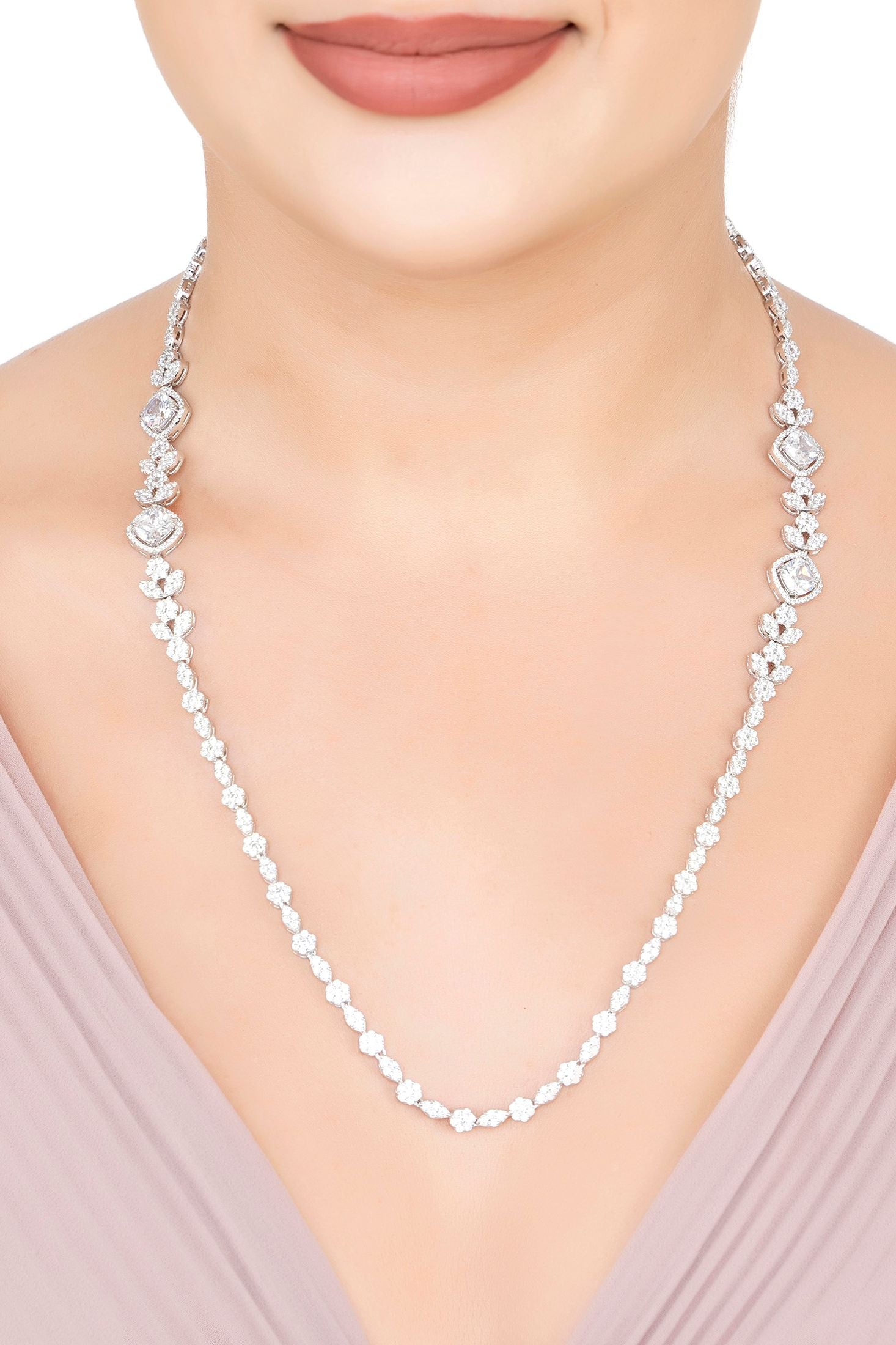 The necklace worn by a model.