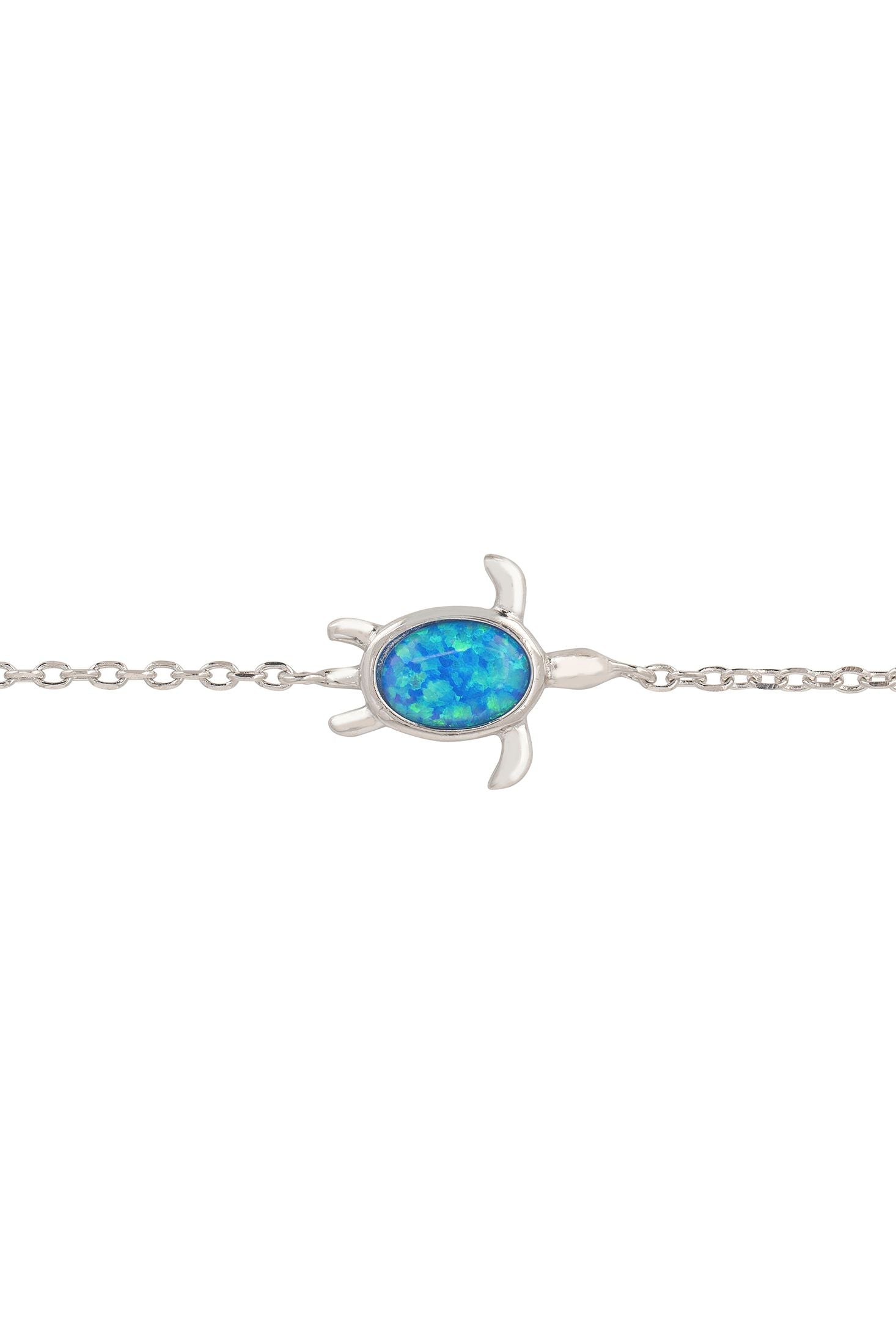 Silver turtle-shaped bracelet with a blue stone on a white background