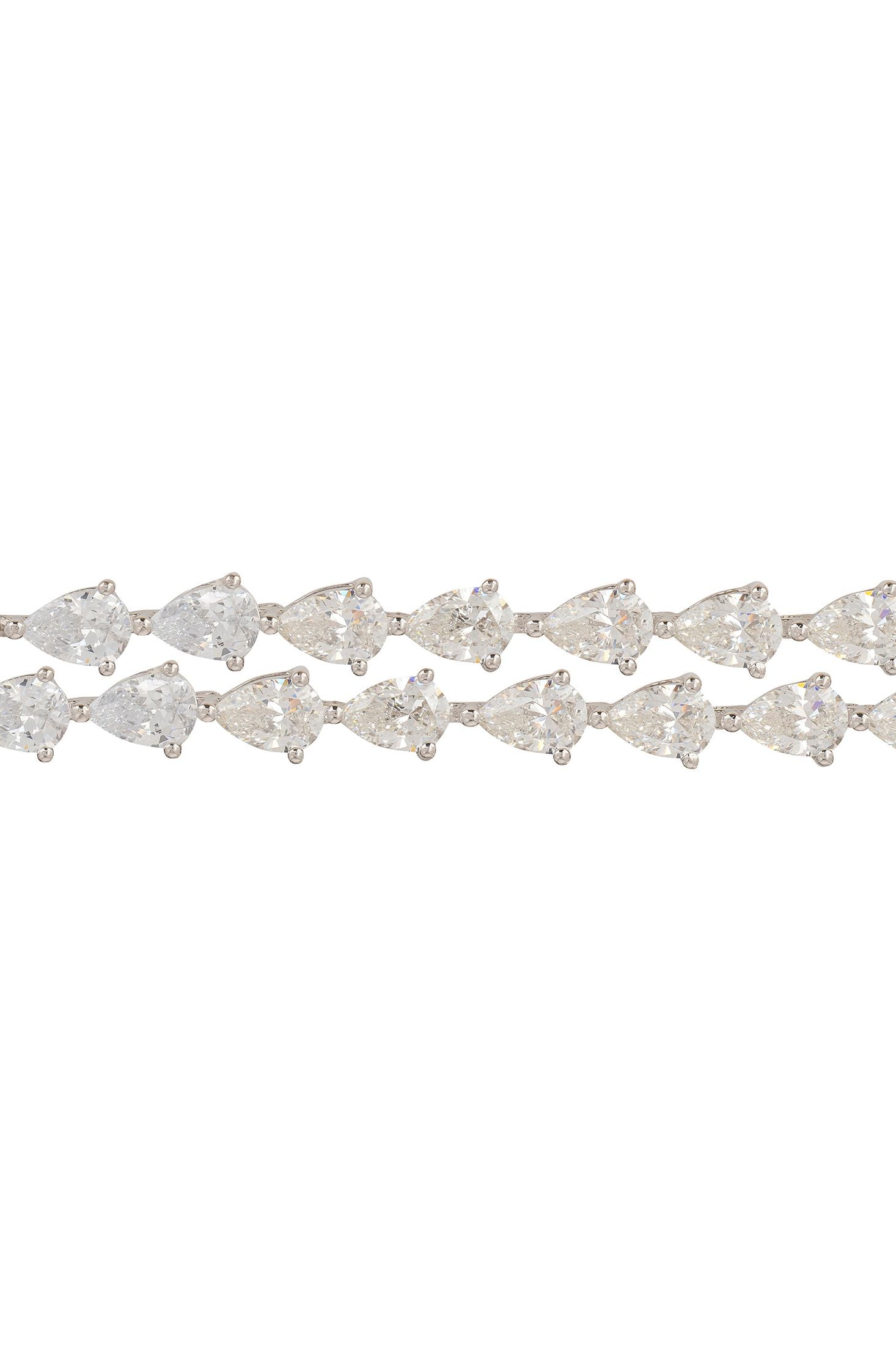 Silver bracelet with clear gemstones on a white background