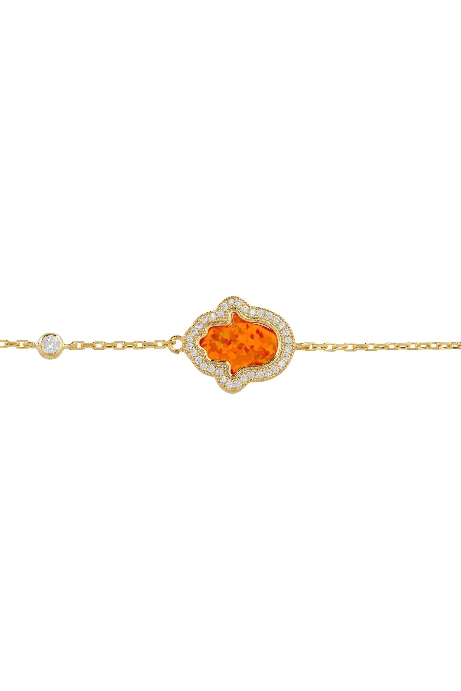 Orange opal hamsa hand gold bracelet.