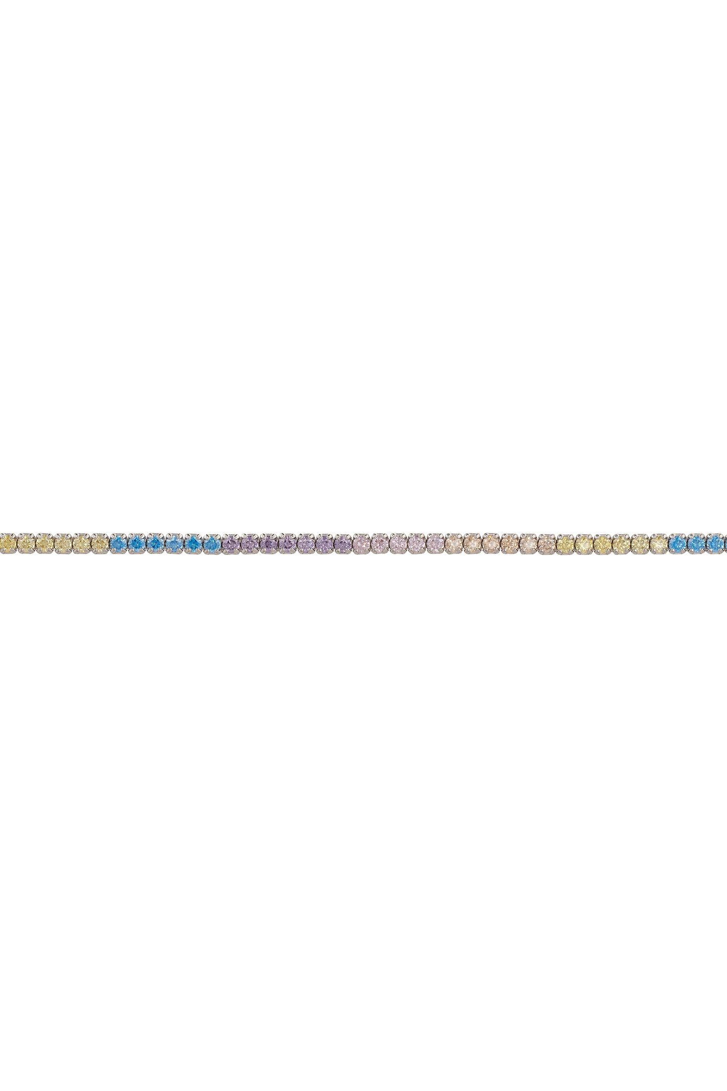 Gold bracelet with small multicoloured stones on a white background