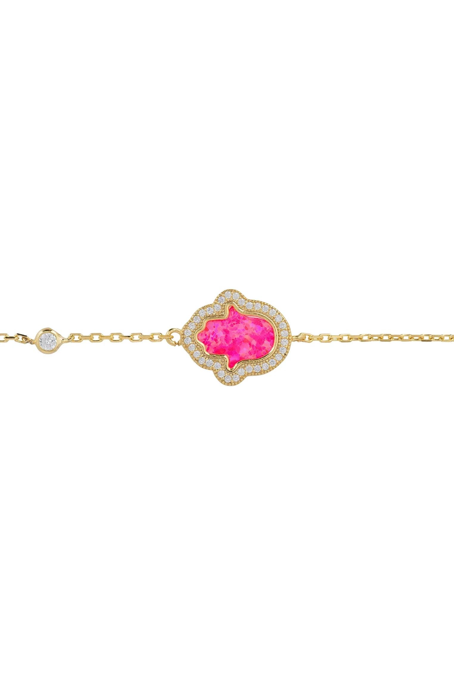 Pink opal hamsa hand gold bracelet.