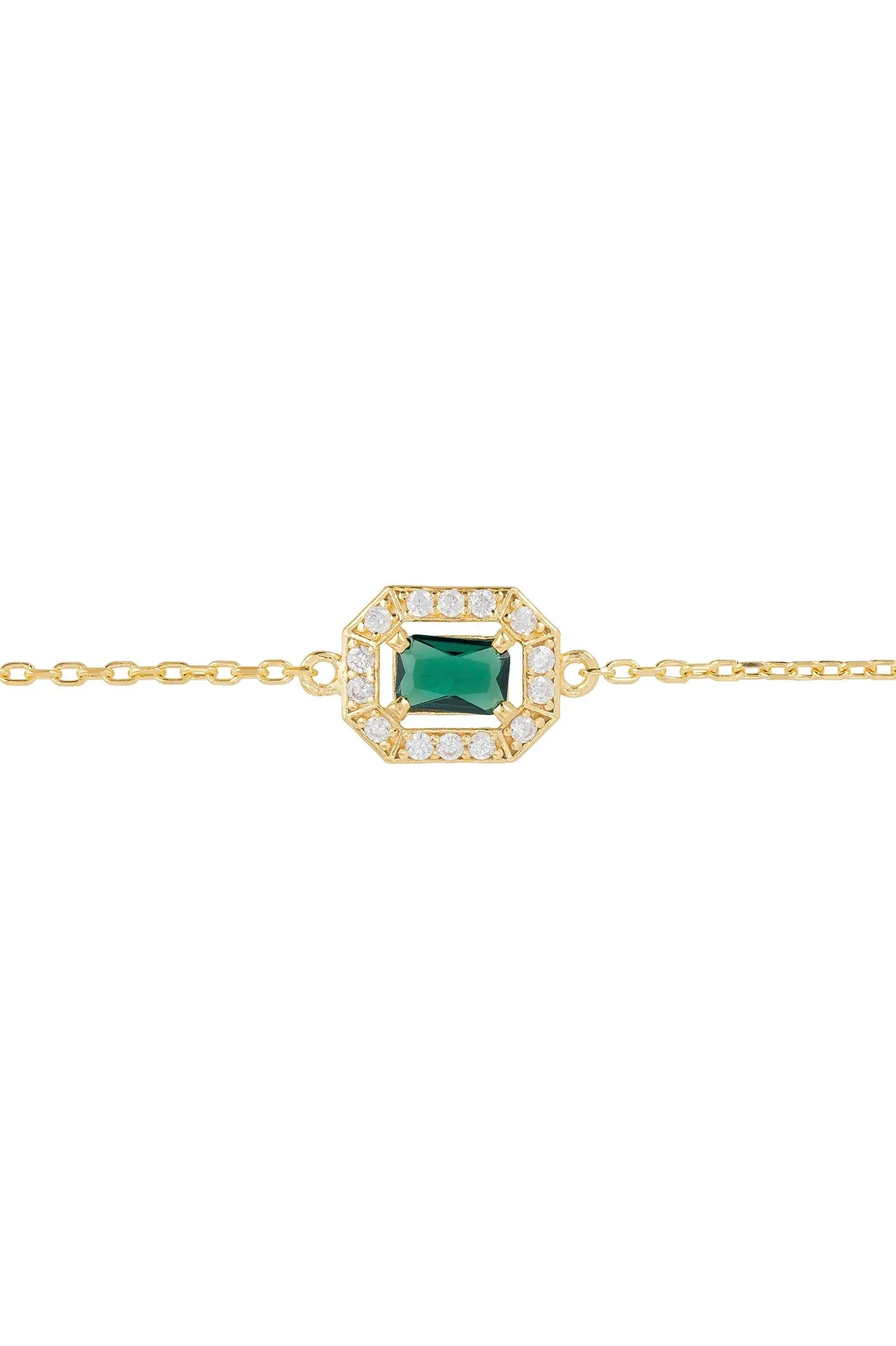Diamond halo emerald charm gold bracelet.