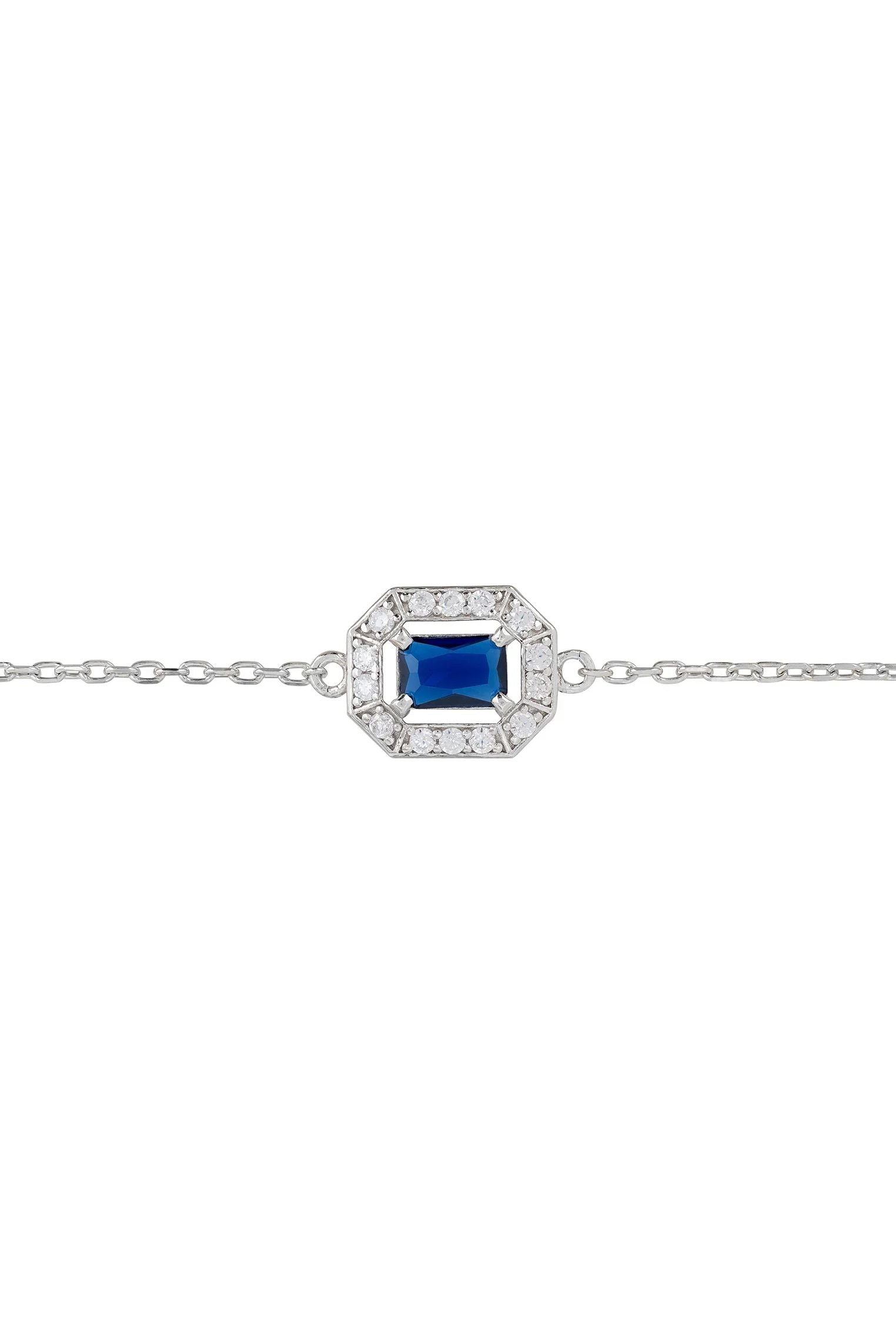 Diamond halo sapphire charm silver bracelet.