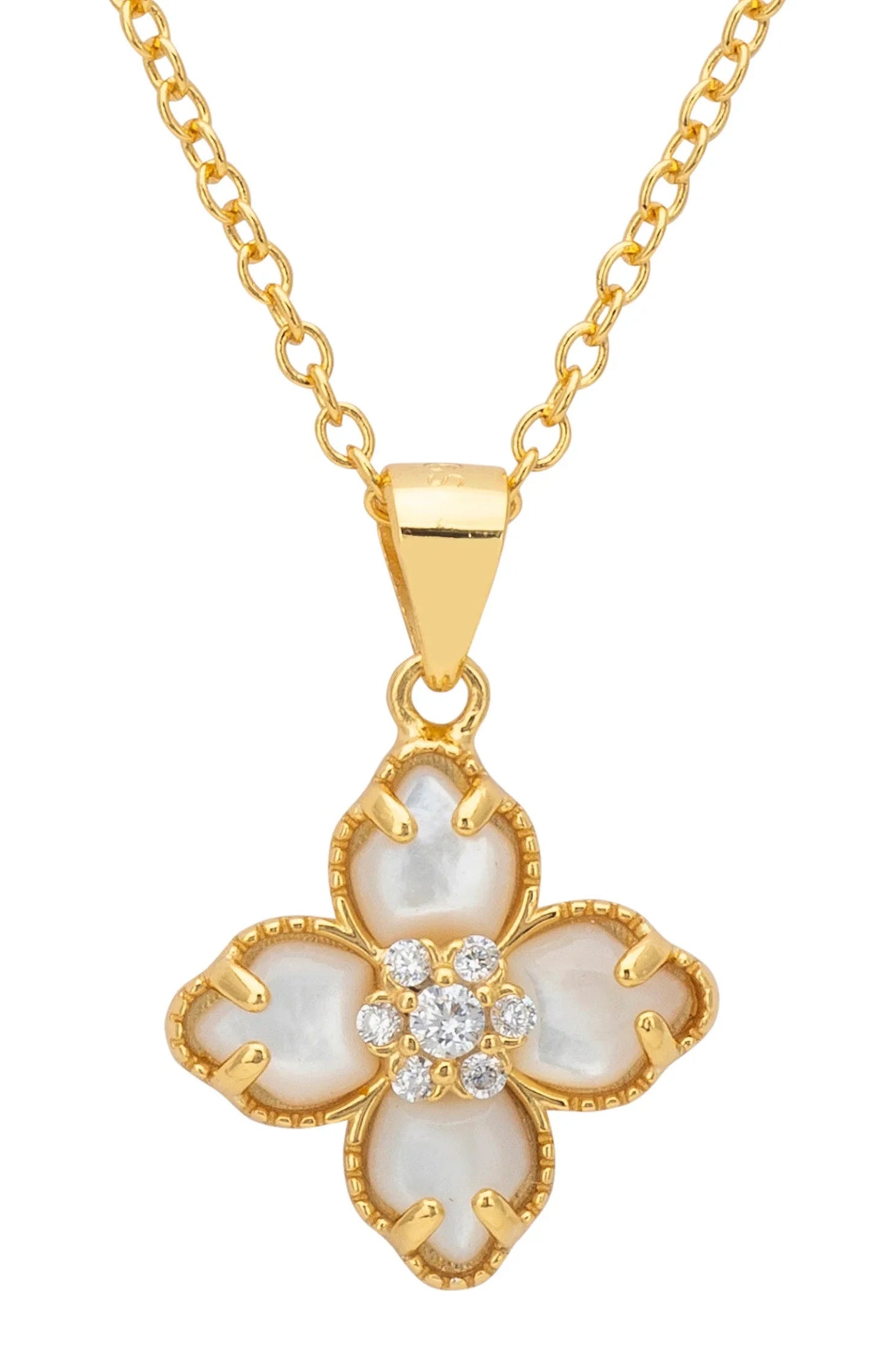 Close-up of the gold and white clover pendant.