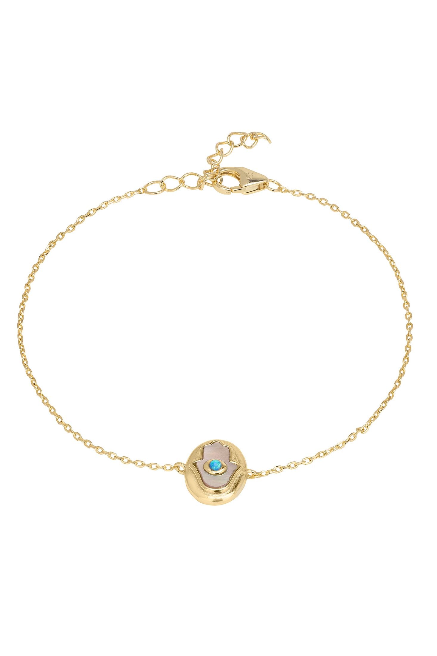 Gold bracelet with a circular charm featuring a blue gemstone on a white background